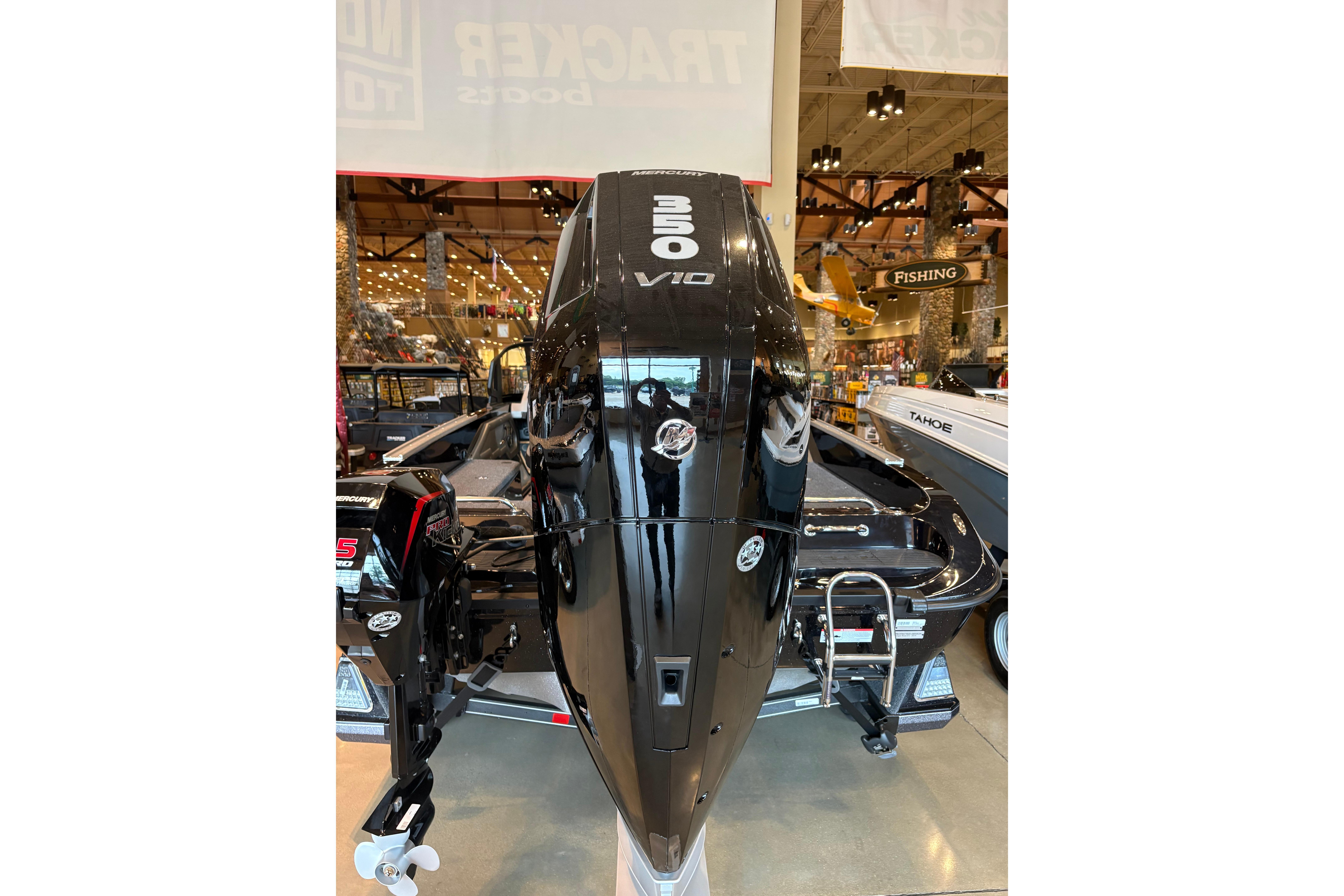 2026 Ranger 621FS Cup-Equipped boat with powerful Mercury V10 engine displayed indoors.