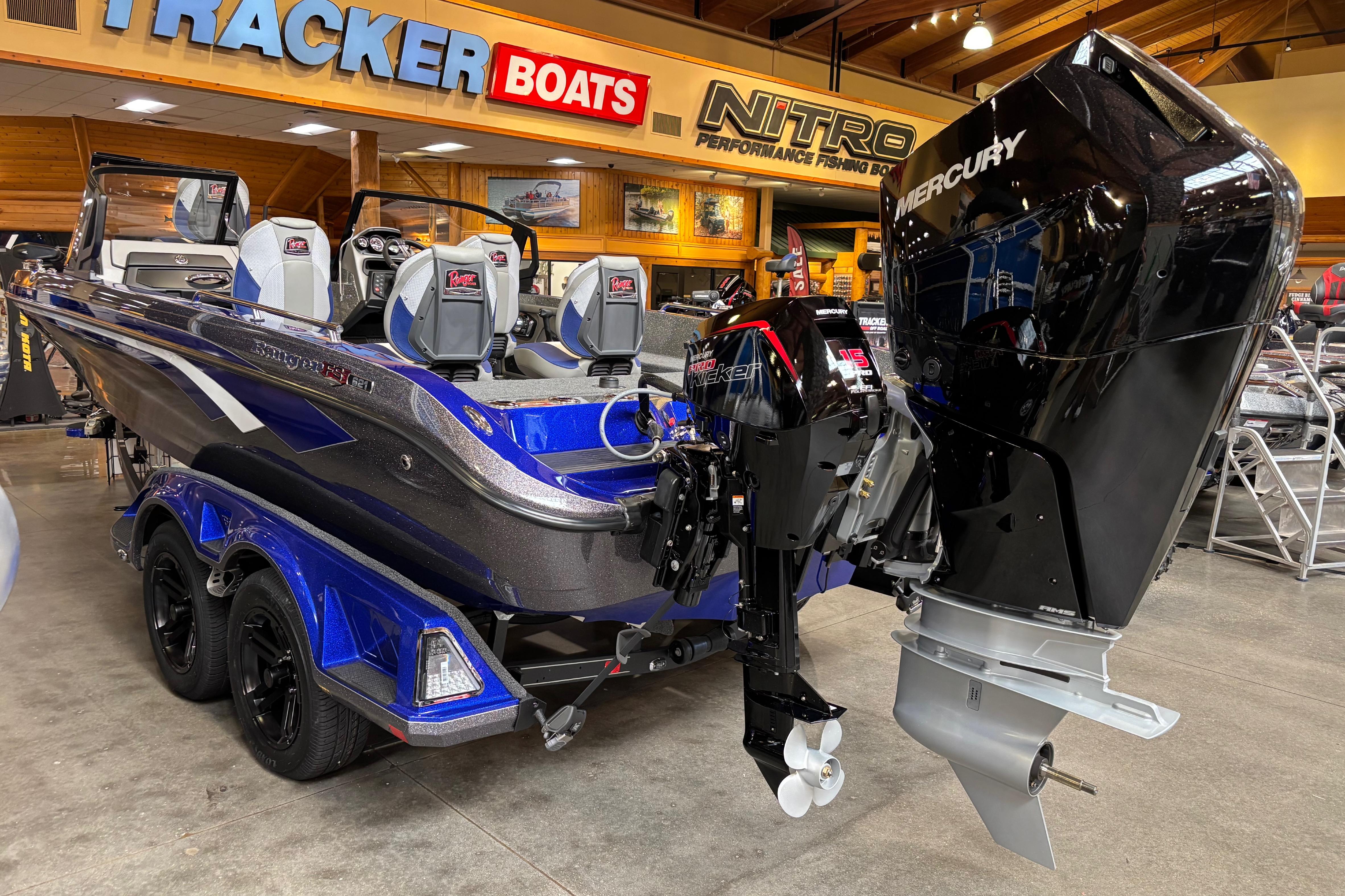 2026 Ranger 621FS Cup-Equipped boat with Mercury engine in showroom.