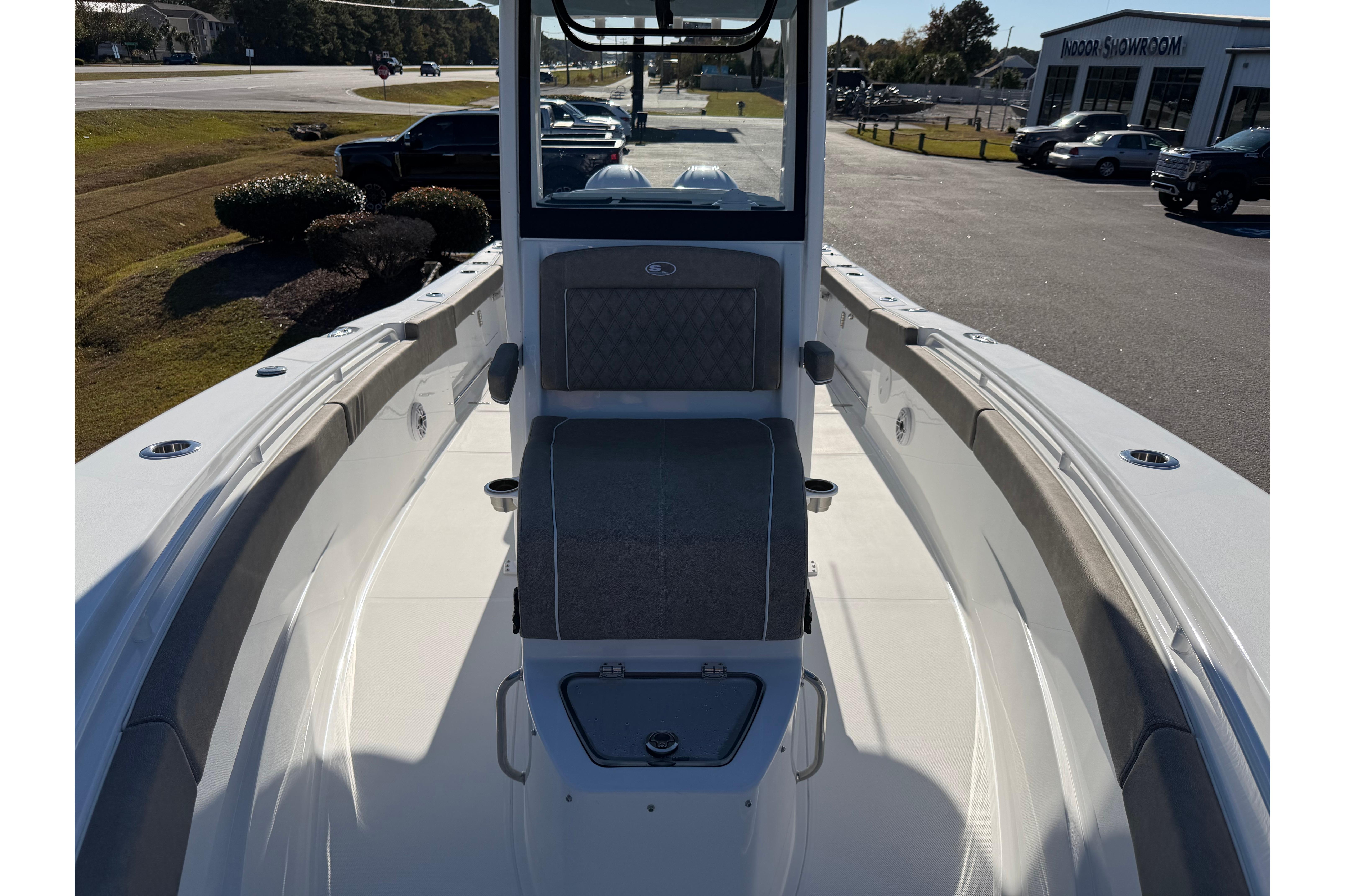 2026 Sea Hunt Ultra 275 Coffin Box boat interior with seating and console.