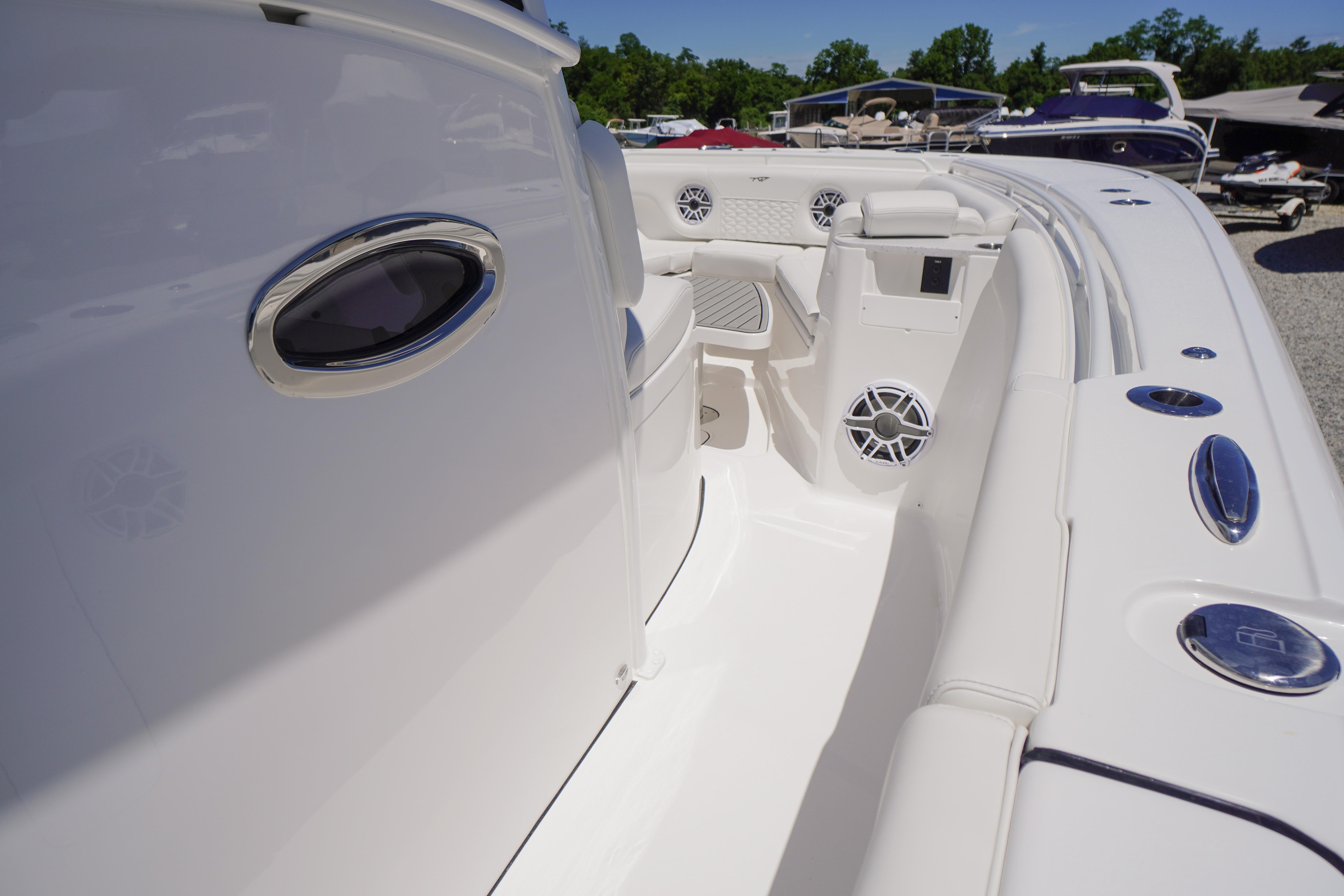 2026 Tidewater 302 CC Adventure boat interior with sleek white design and modern features.