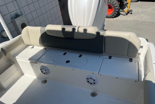 2026 Key West 239 FS boat interior with cushioned seating and storage compartments.