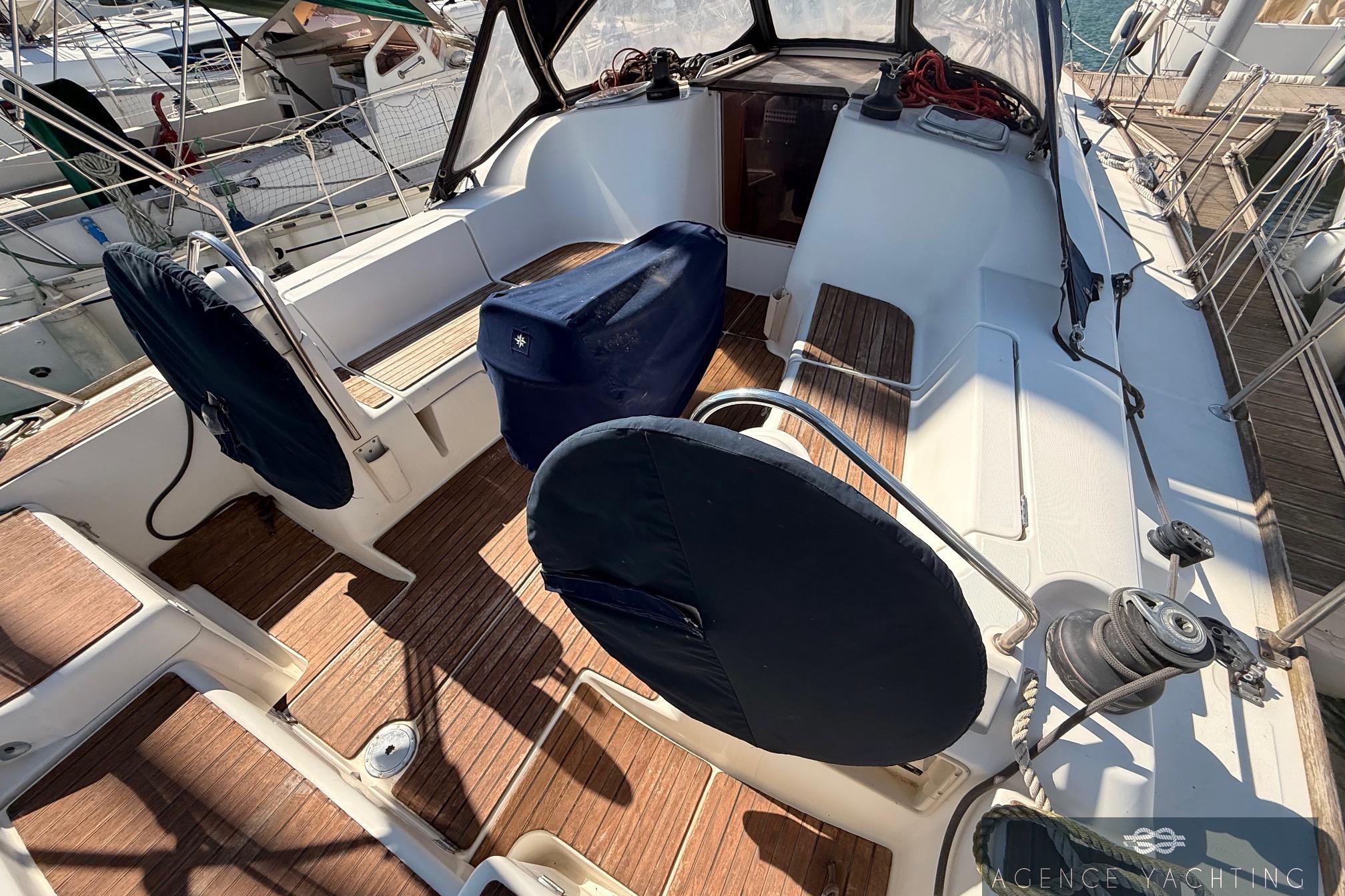 Cockpit of 2009 Jeanneau Sun Odyssey 39i Performance sailboat with covered seating.