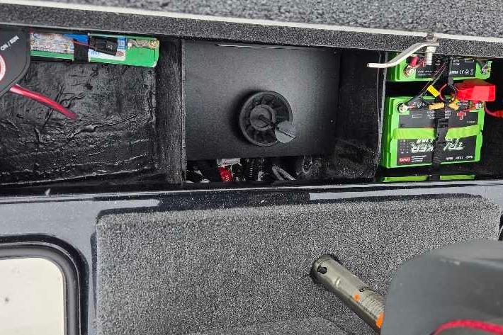 2025 Ranger Z518 boat battery compartment with wiring and components.