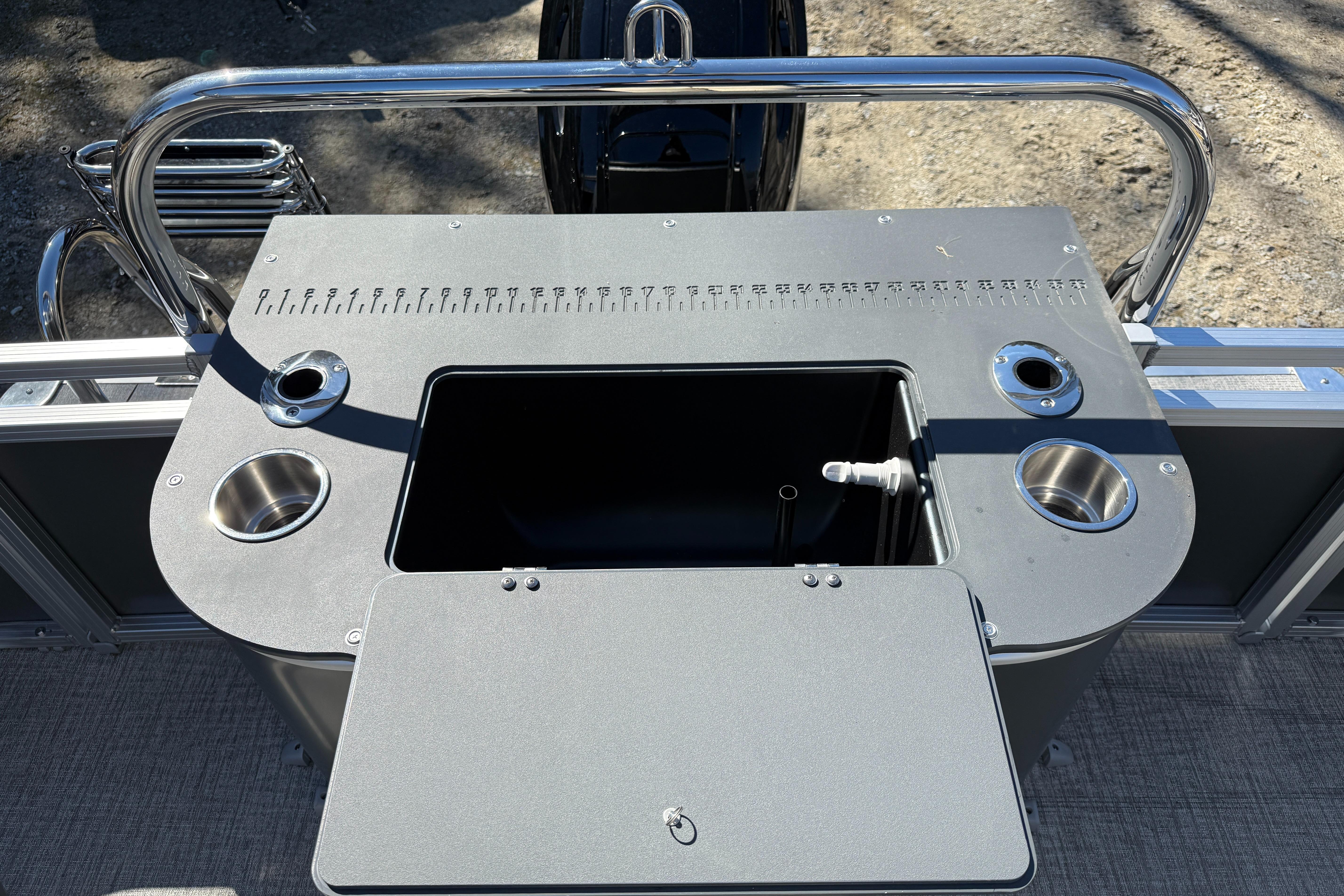 2026 Tahoe Pontoon Sport 85 Rear Fish fishing station with cup holders and storage compartment.