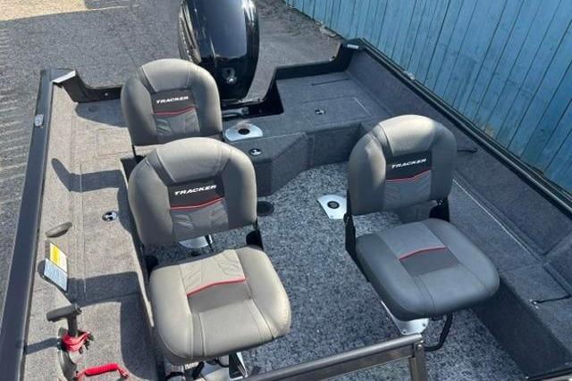 2026 Tracker Pro Guide V-16 WT boat interior with two cushioned seats.