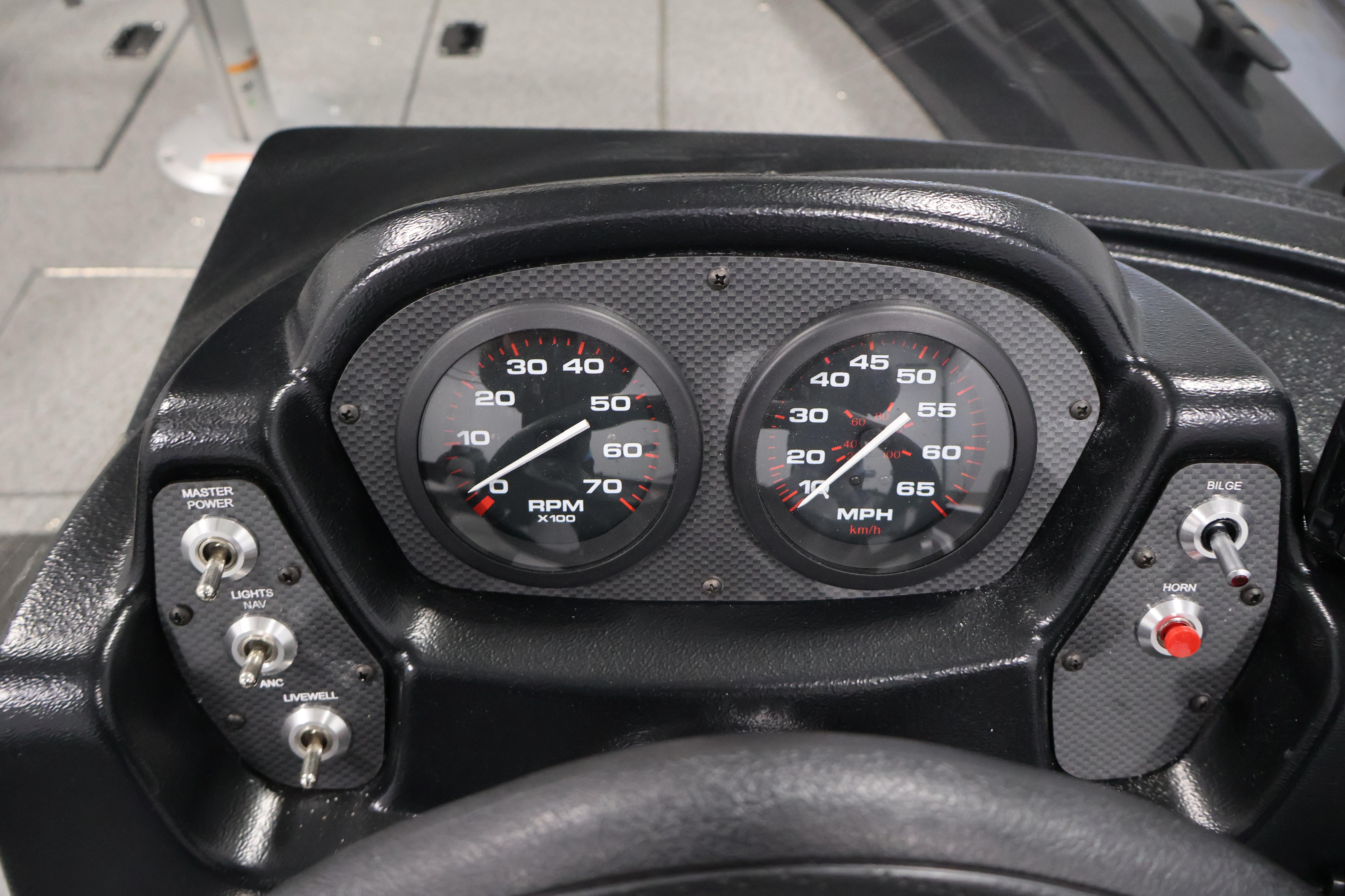 Dashboard of 2026 Crestliner 1850 Kodiak SC boat with speedometer and RPM gauges.