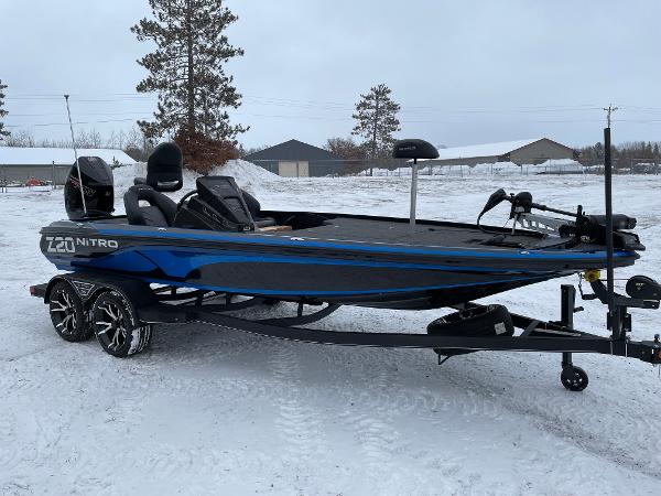2023 Nitro Z20 fishing boat on a snowy landscape.