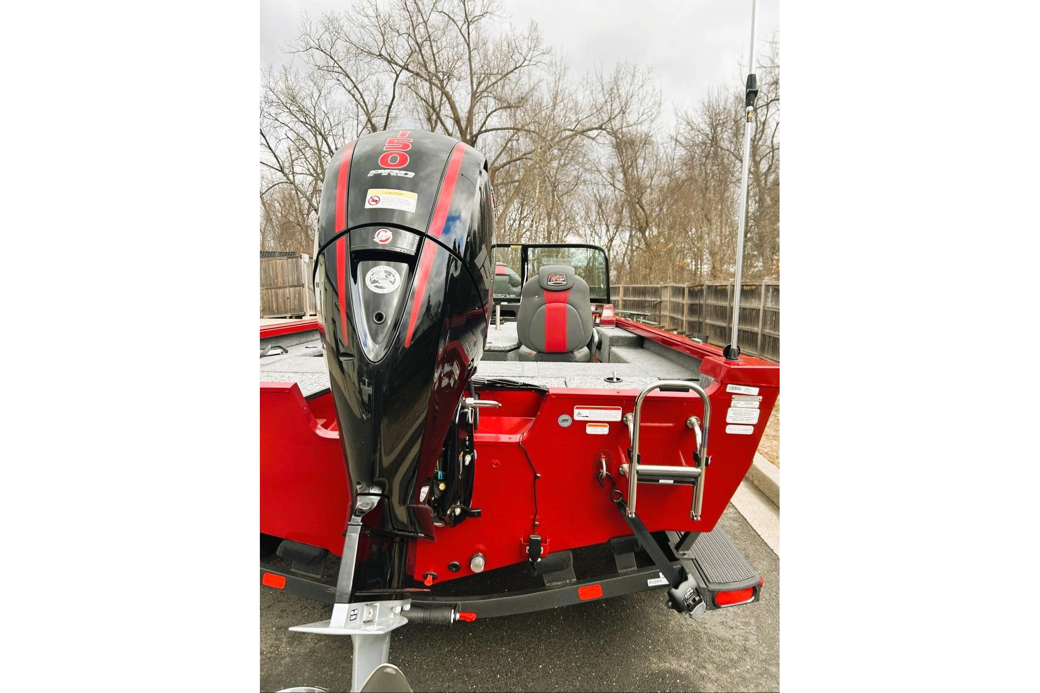 2026 Ranger VS1782SC Reata boat with powerful outboard motor, red exterior, and sleek design.