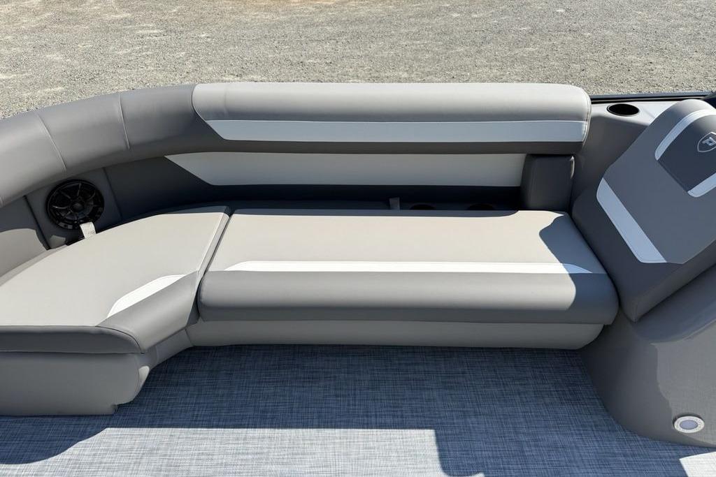 2026 Premier 220 Sunscape RF boat interior with gray seating and cup holders.