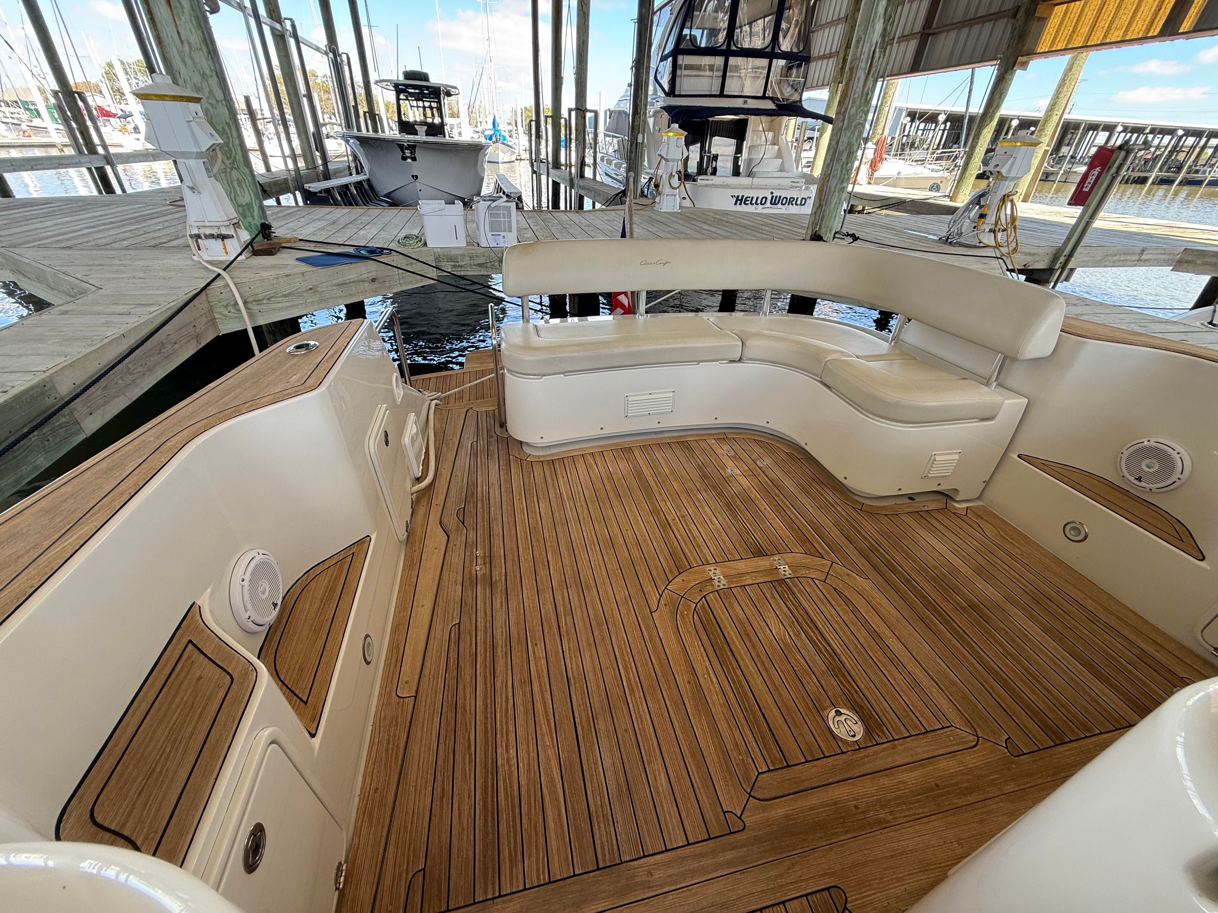 2007 Chris-Craft Roamer 40 with elegant wood finish in a marina.