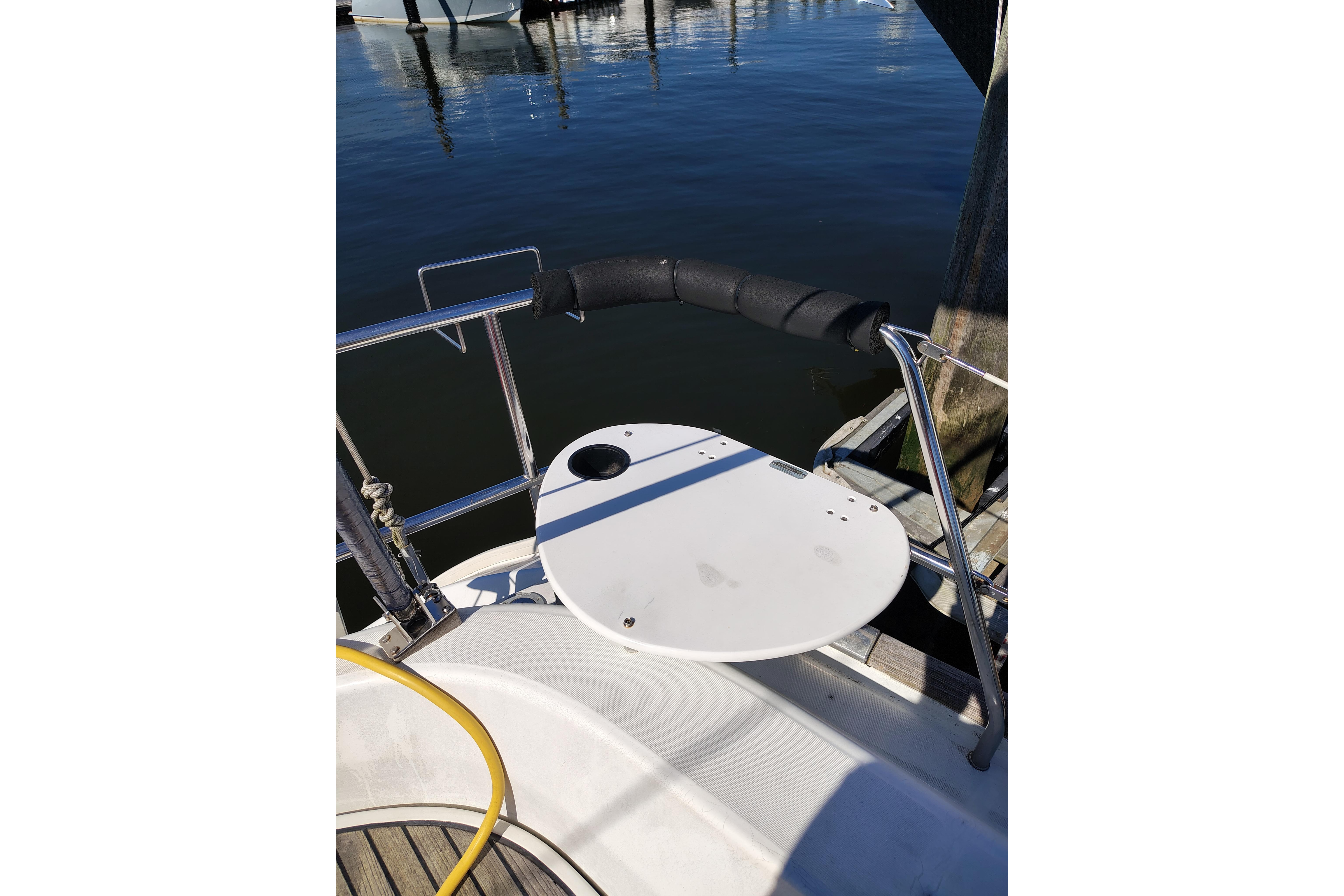 Beneteau Oceanis 411 sailboat stern detail, docked at marina, 2001 model.