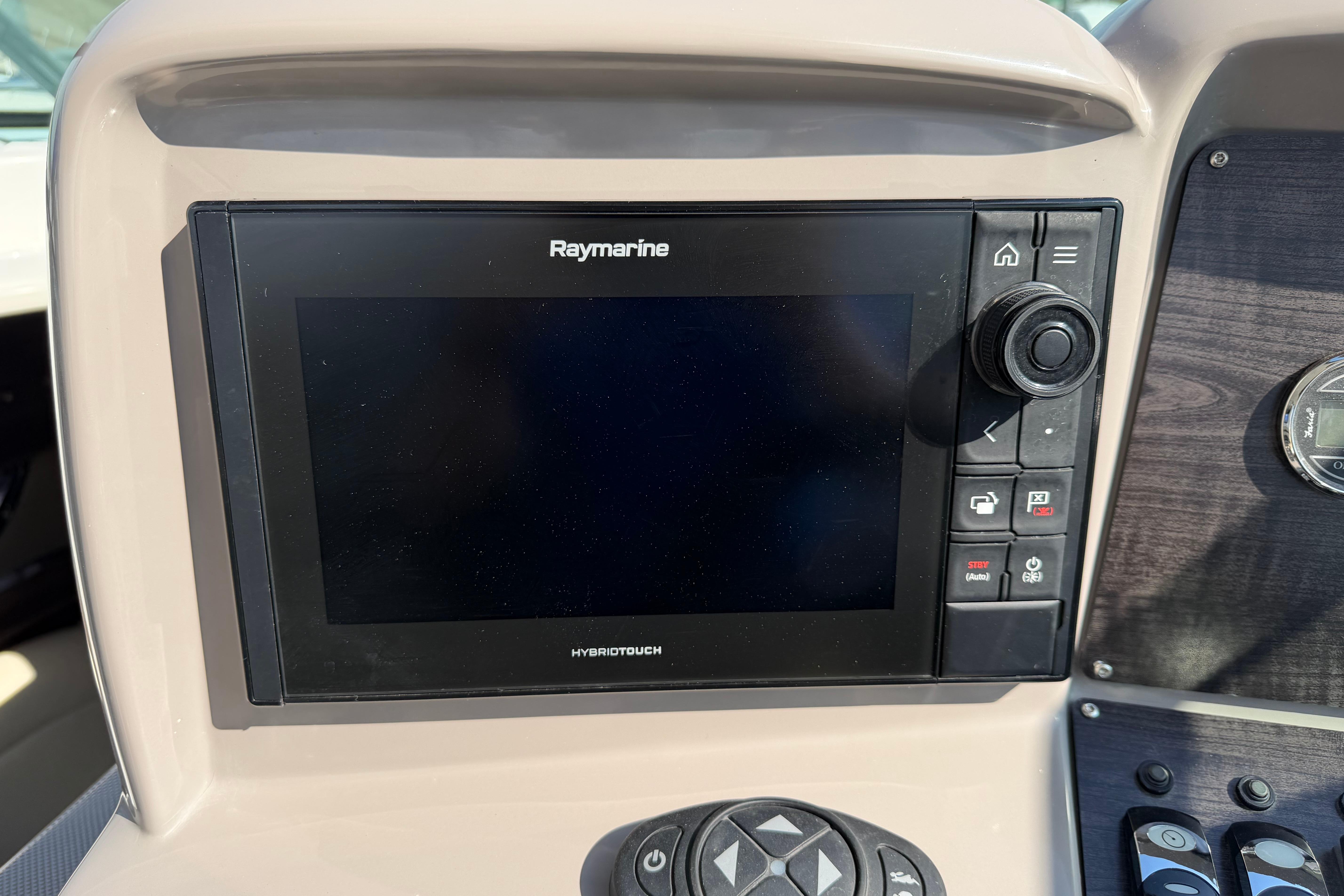 Raymarine HybridTouch display on 2019 Rinker EX 320 boat dashboard.