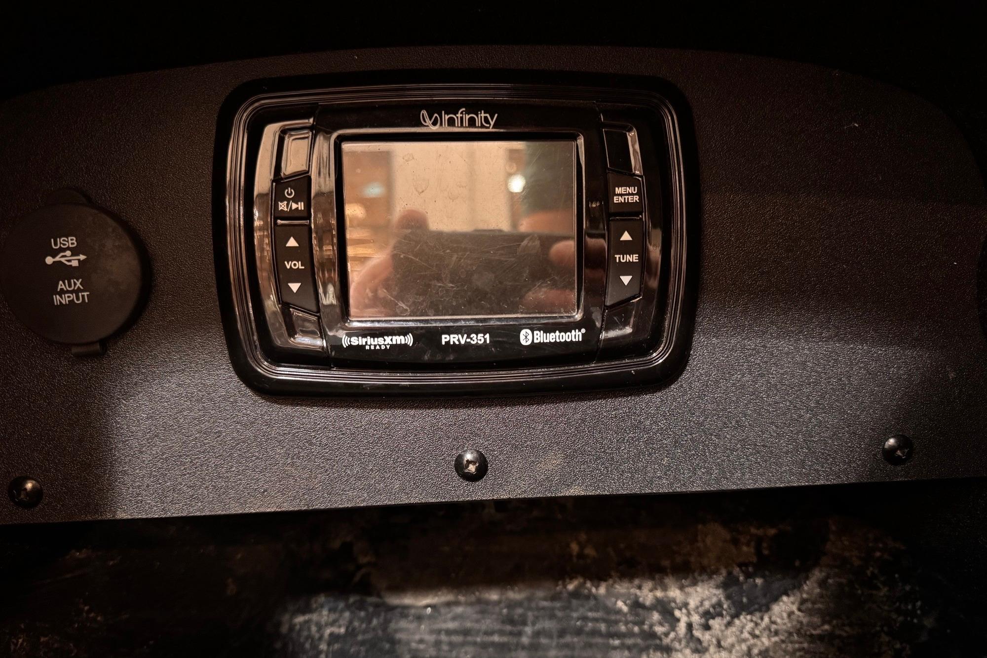 Dashboard of a 2017 Ranger Z520 Comanche with Infinity Bluetooth stereo system.