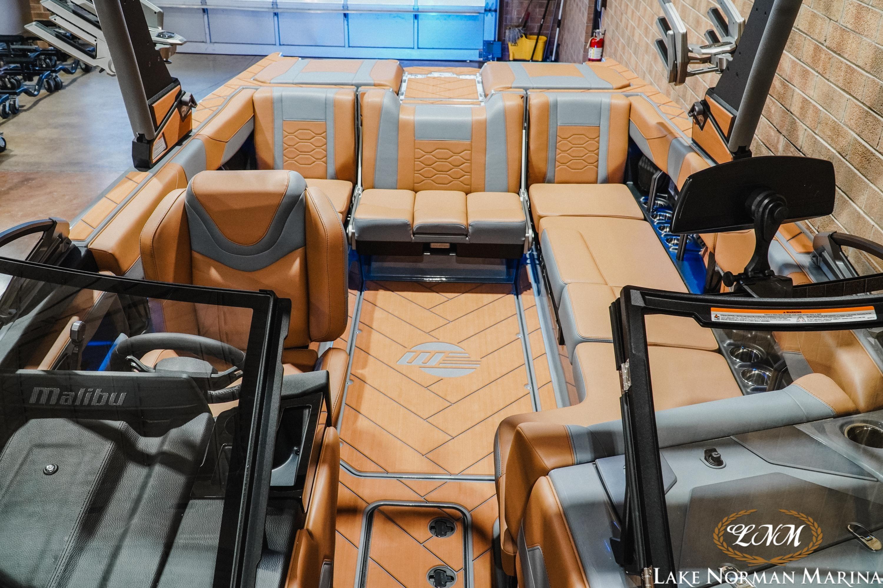 2026 Malibu Wakesetter 23 LSV interior with luxurious tan and gray seating.
