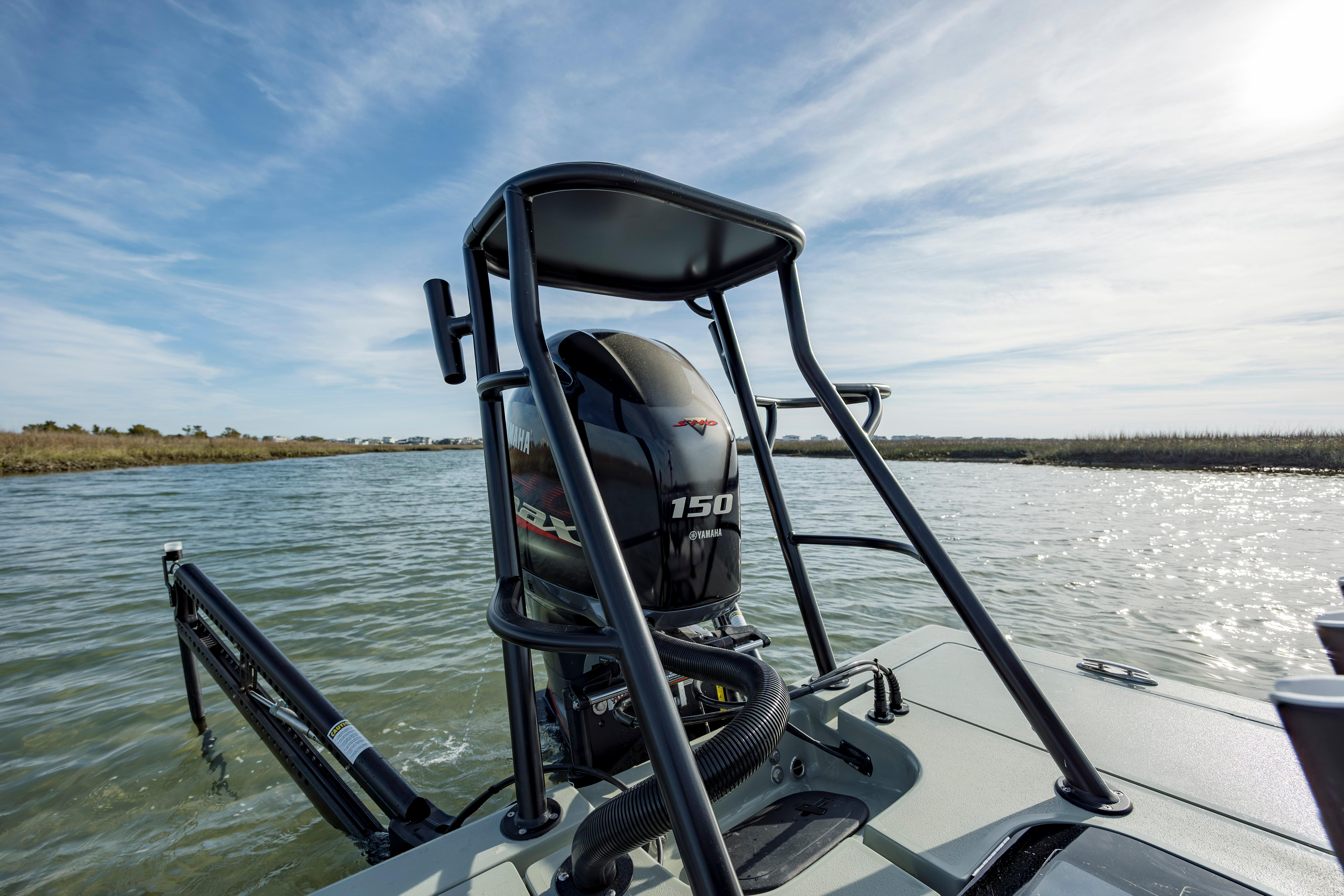 Boat with Yamaha 150 engine on water, Vtech model 18, 2025.