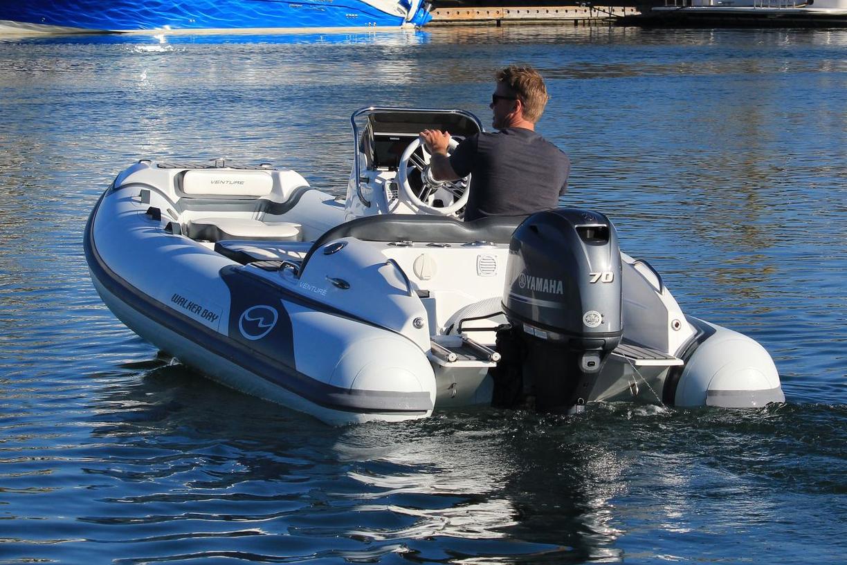 Manufacturer Provided Image: 2022 Walker Bay Venture 14 boat with Yamaha engine on water.