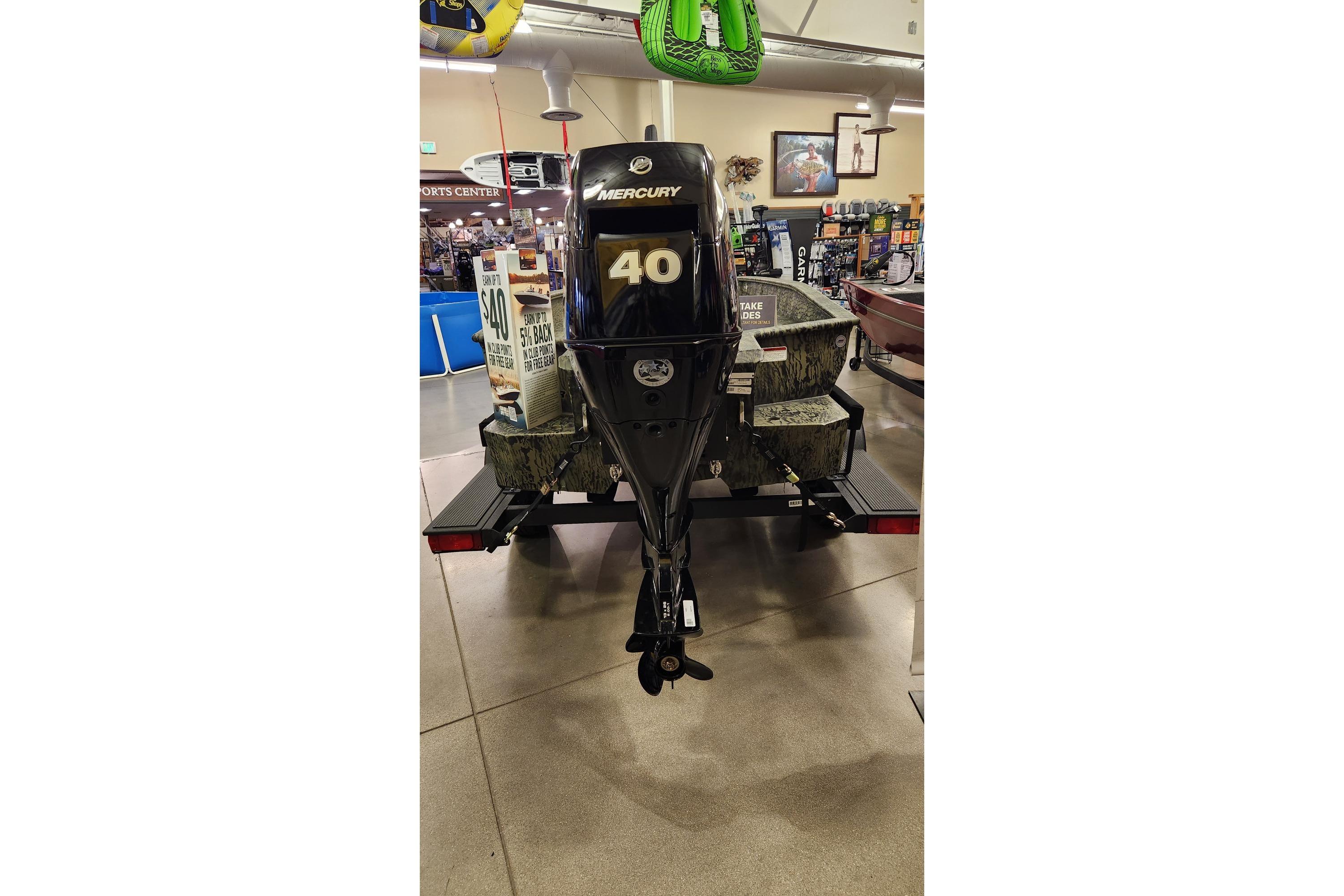 2025 Tracker Grizzly 1650 T Prairie Wings Edition with Mercury 40 outboard motor on display.