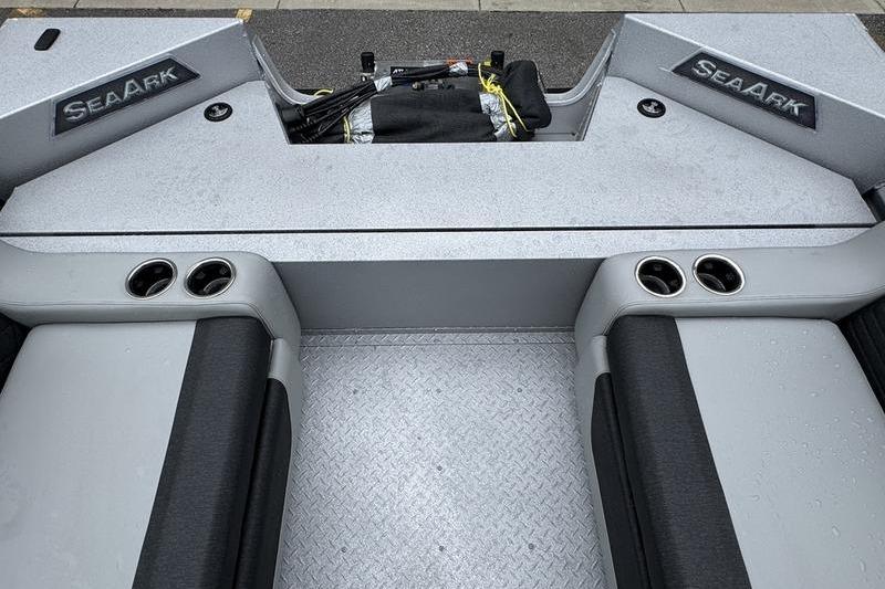 2025 SeaArk Super Lounge Easy boat interior with seating and cup holders.