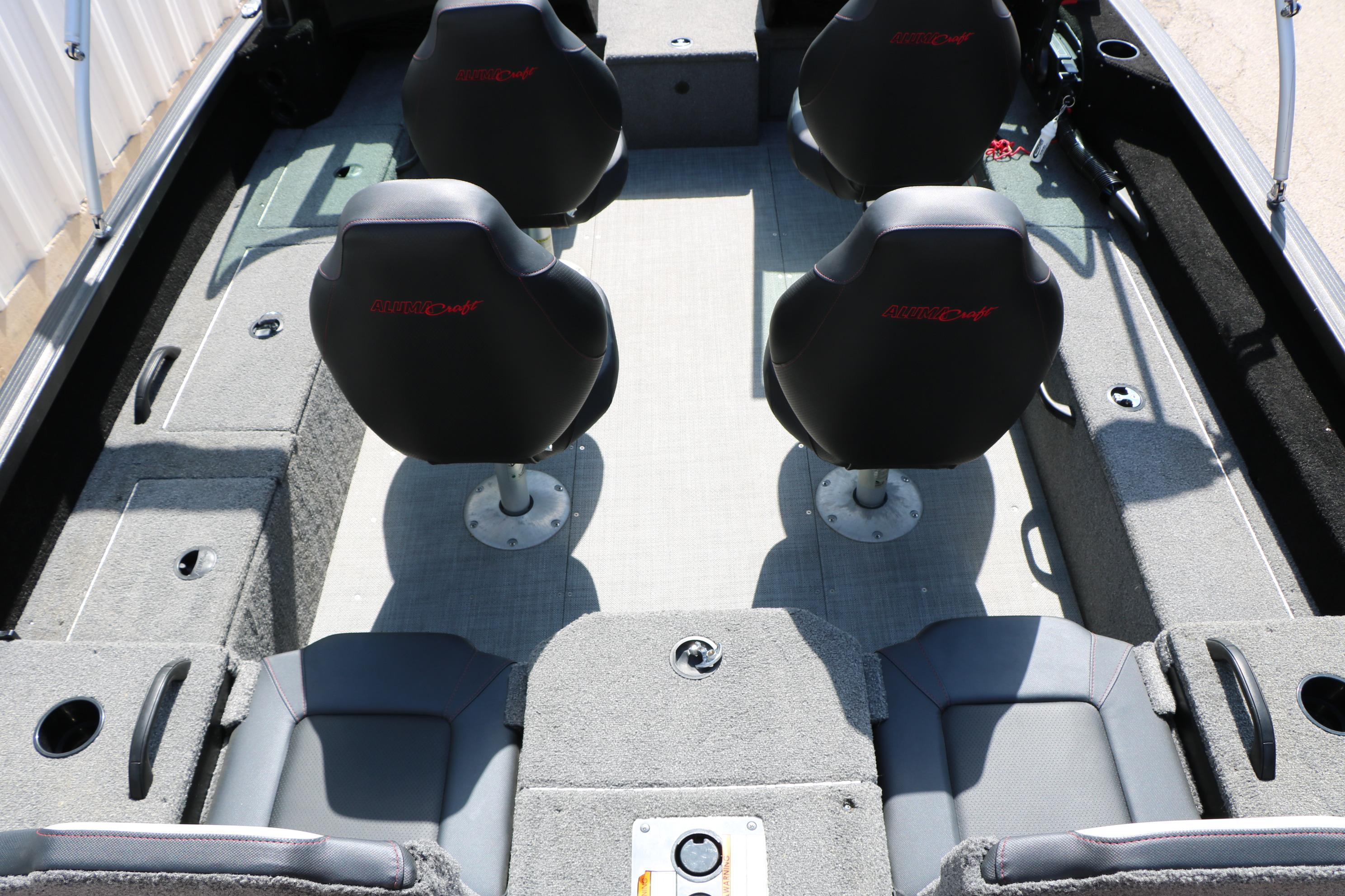 2023 Alumacraft Competitor FSX 185 boat interior with four seats and ample storage.