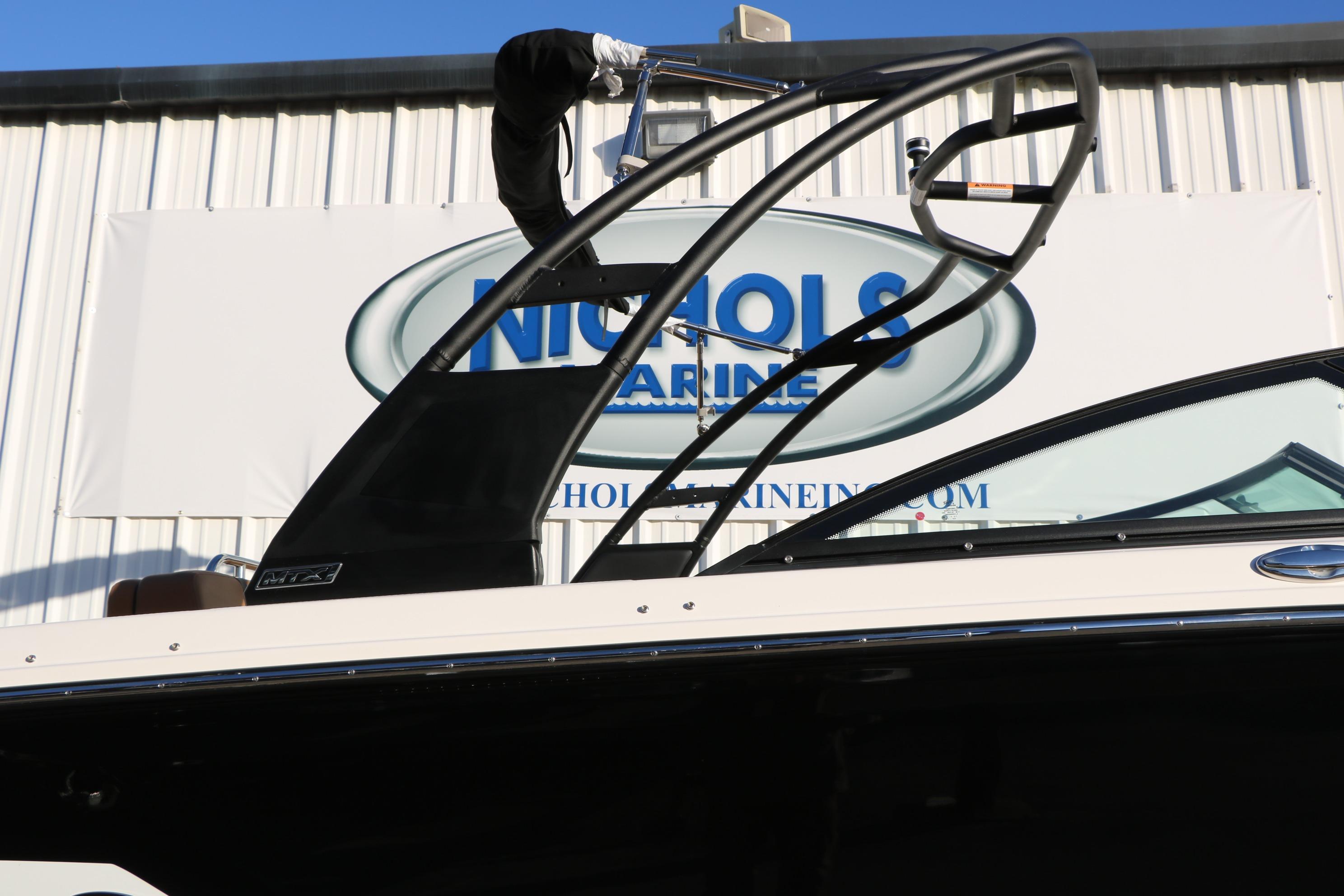 2026 Chaparral 247 SSX boat at Nichols Marine dealership.
