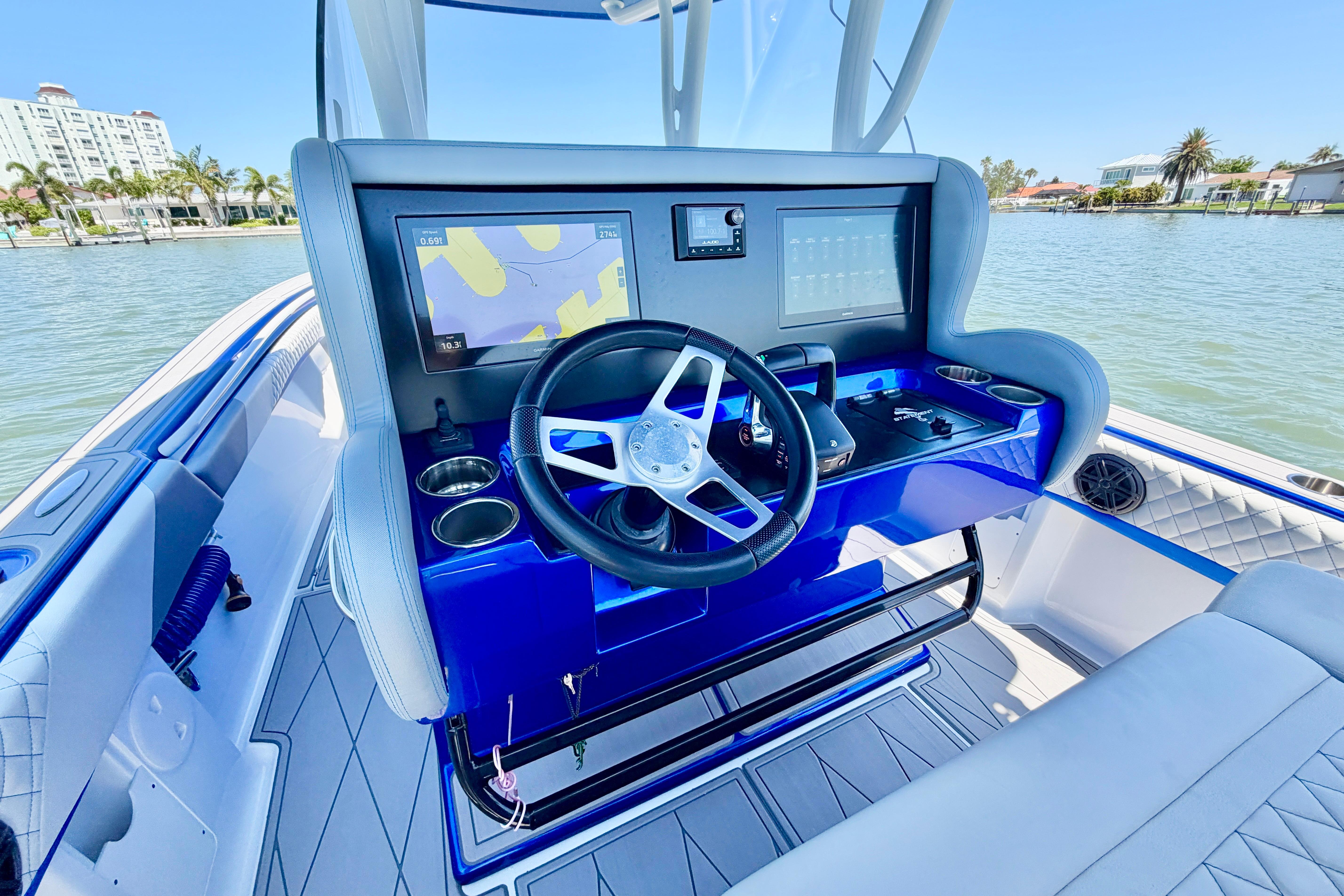 Cockpit of 2022 Statement 350 Open boat with modern navigation system and sleek design.