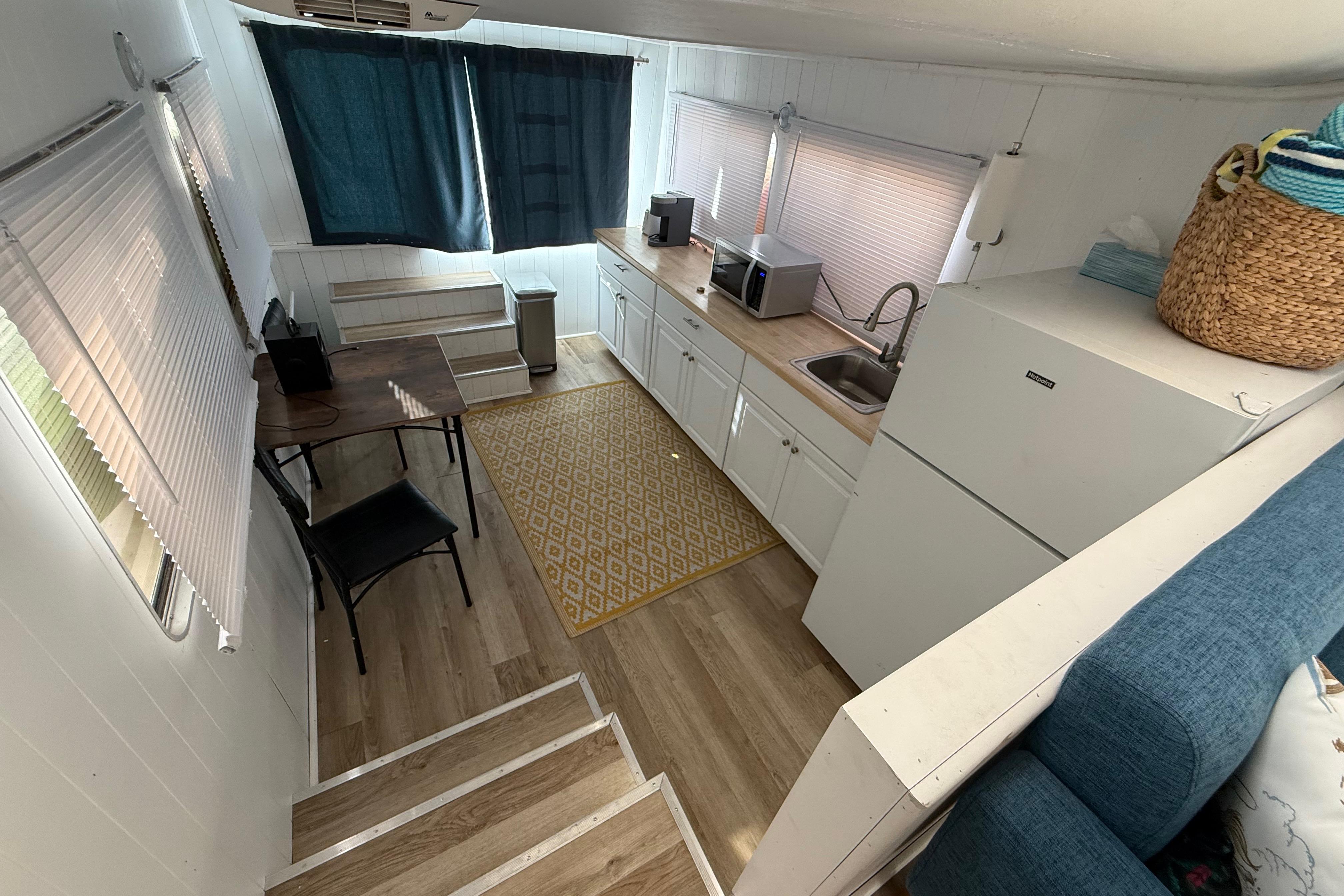 Interior of 1983 Holiday Mansion 37 Barracuda houseboat with kitchen and dining area.