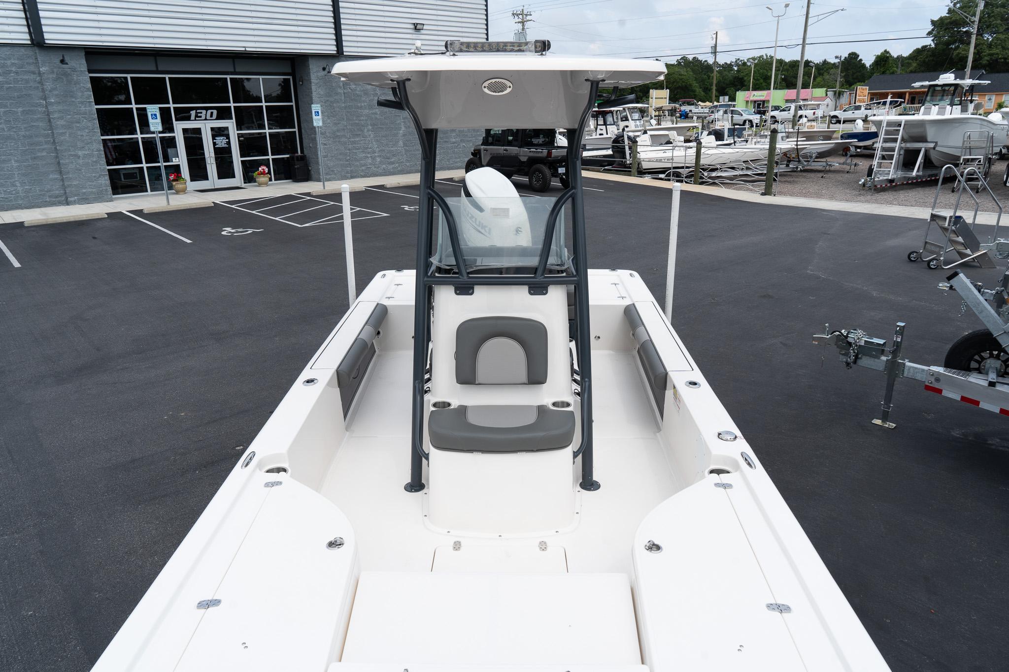 2024 Sea Born FX24 Bay boat at a dealership.