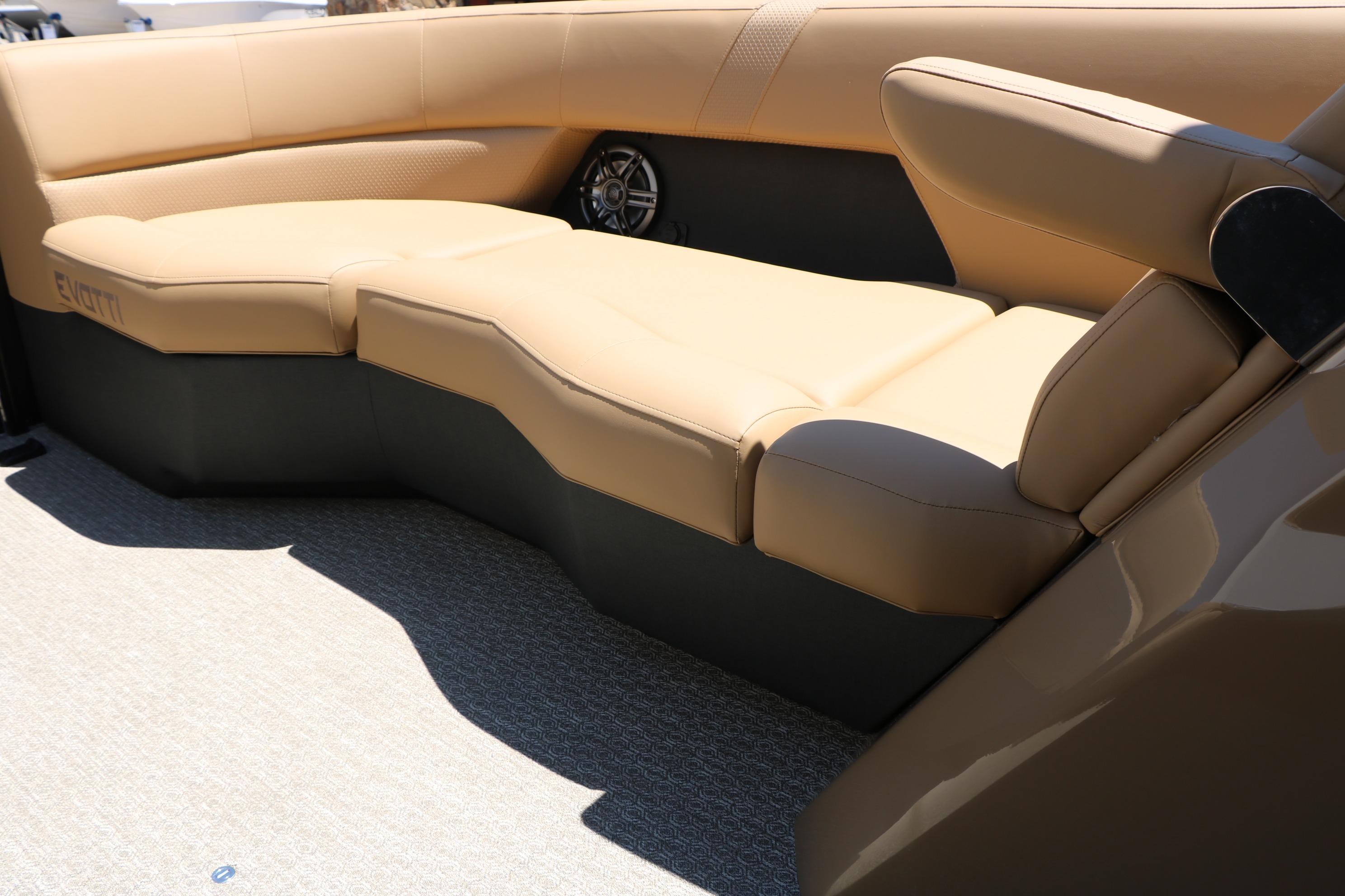 Luxurious tan seating in 2026 Evotti 521CS boat interior.