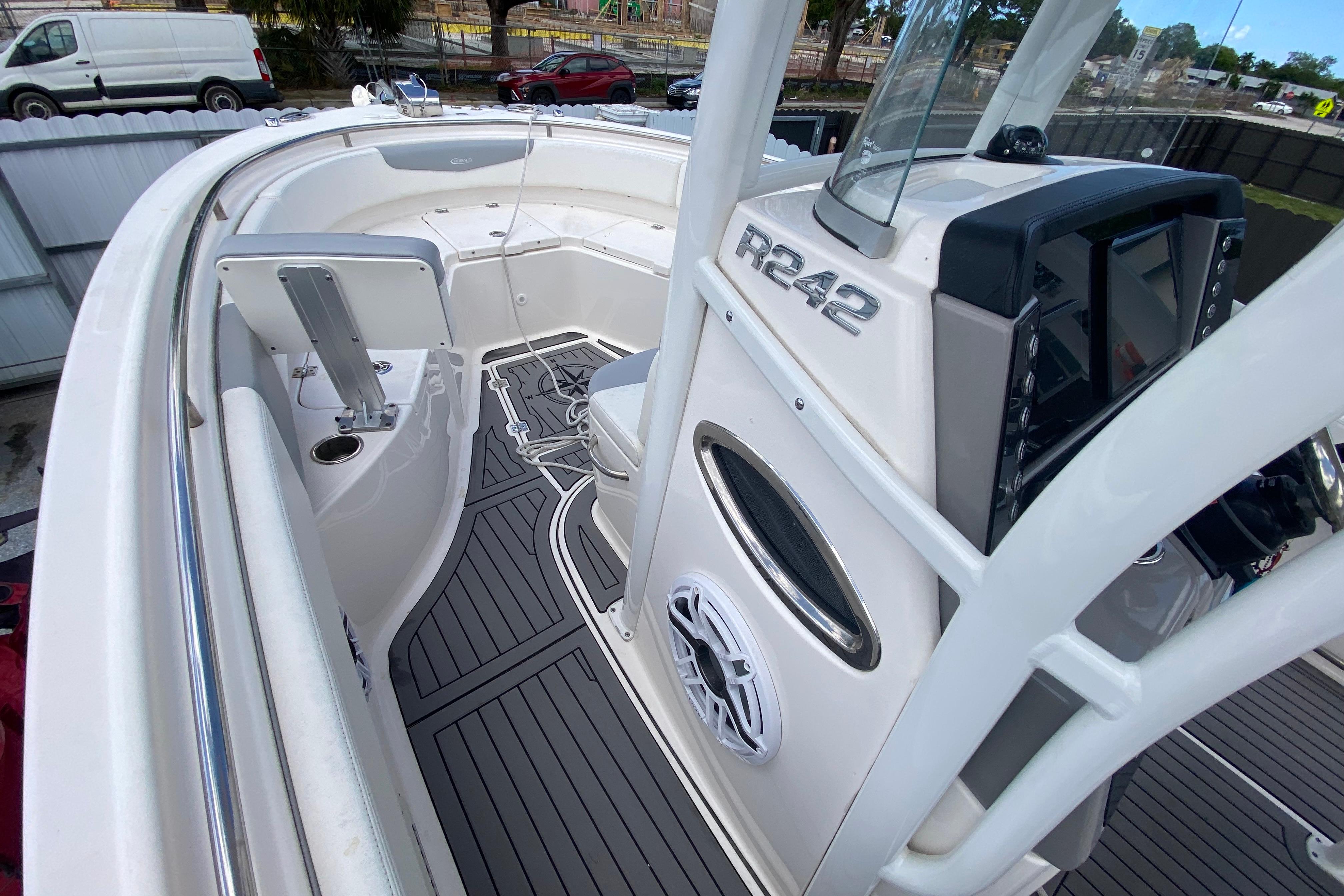 2022 Robalo R242 Center Console boat interior with modern dashboard and seating.