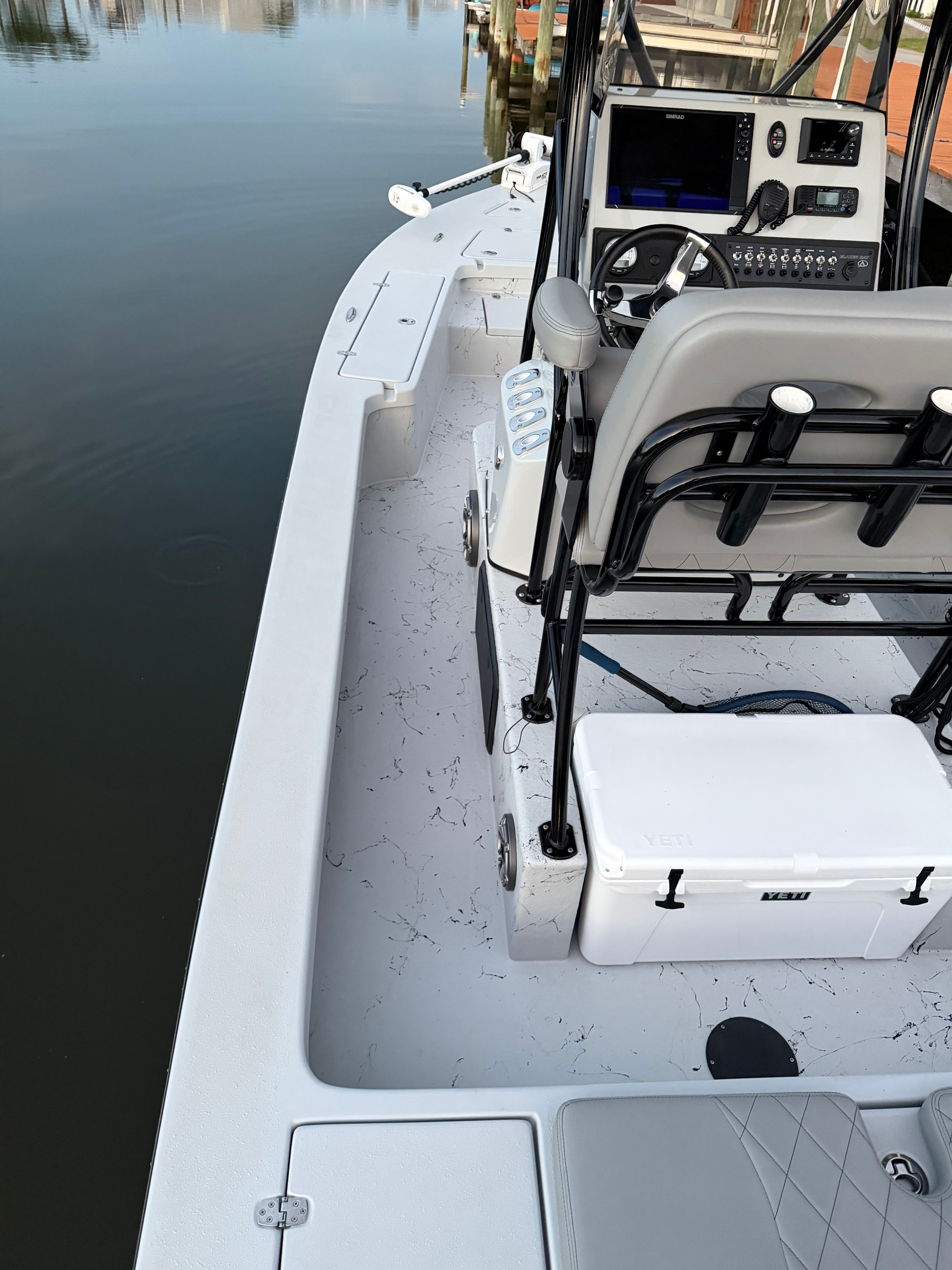 The image shows the deck of a 2022 Blazer Bay 2420 GTS boat with a helm console.