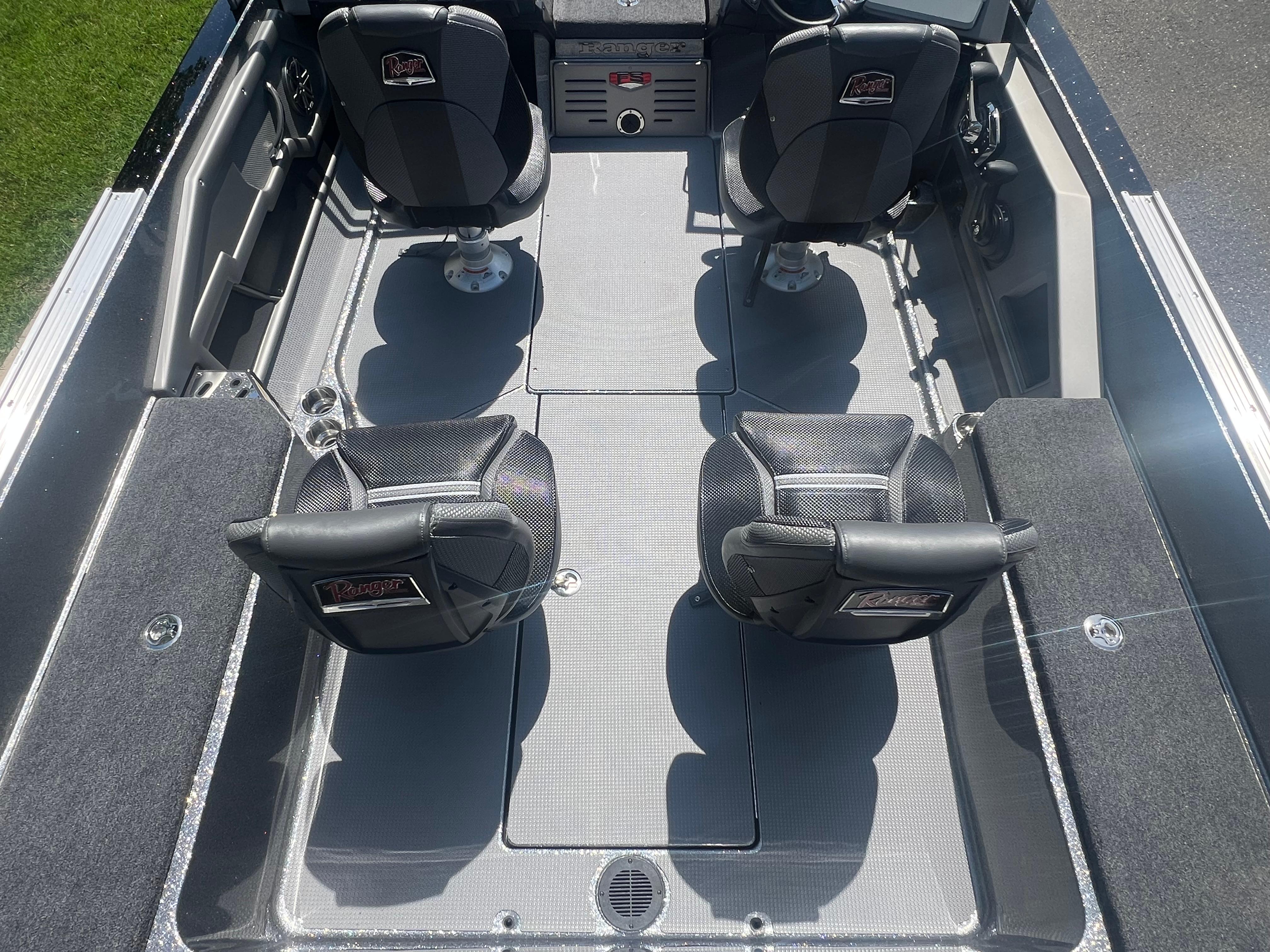 2025 Ranger 621FS Cup Equipped boat interior with four black seats and sleek design.