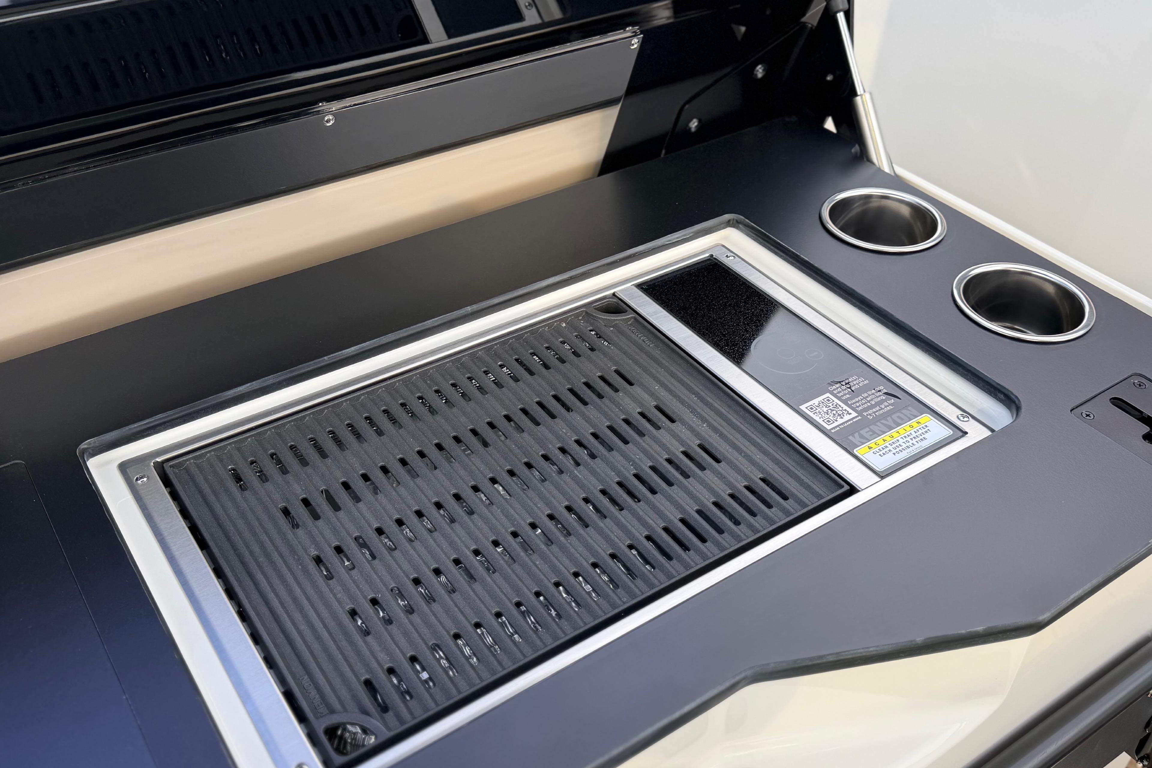 Navan S30 2026 vehicle interior with integrated grill and cup holders.