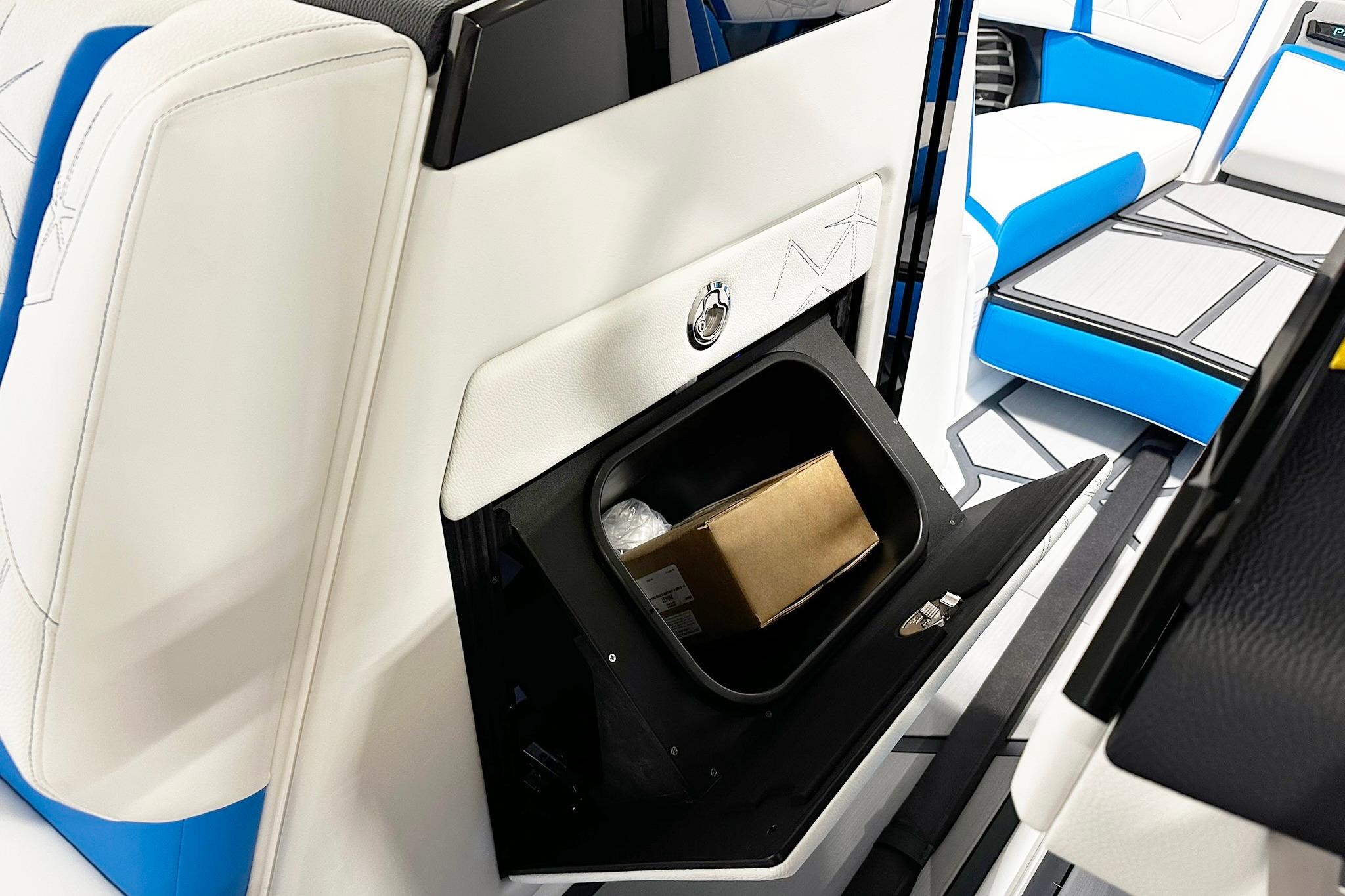 2025 Nautique Super Air Nautique G23 Paragon interior storage compartment with sleek design.