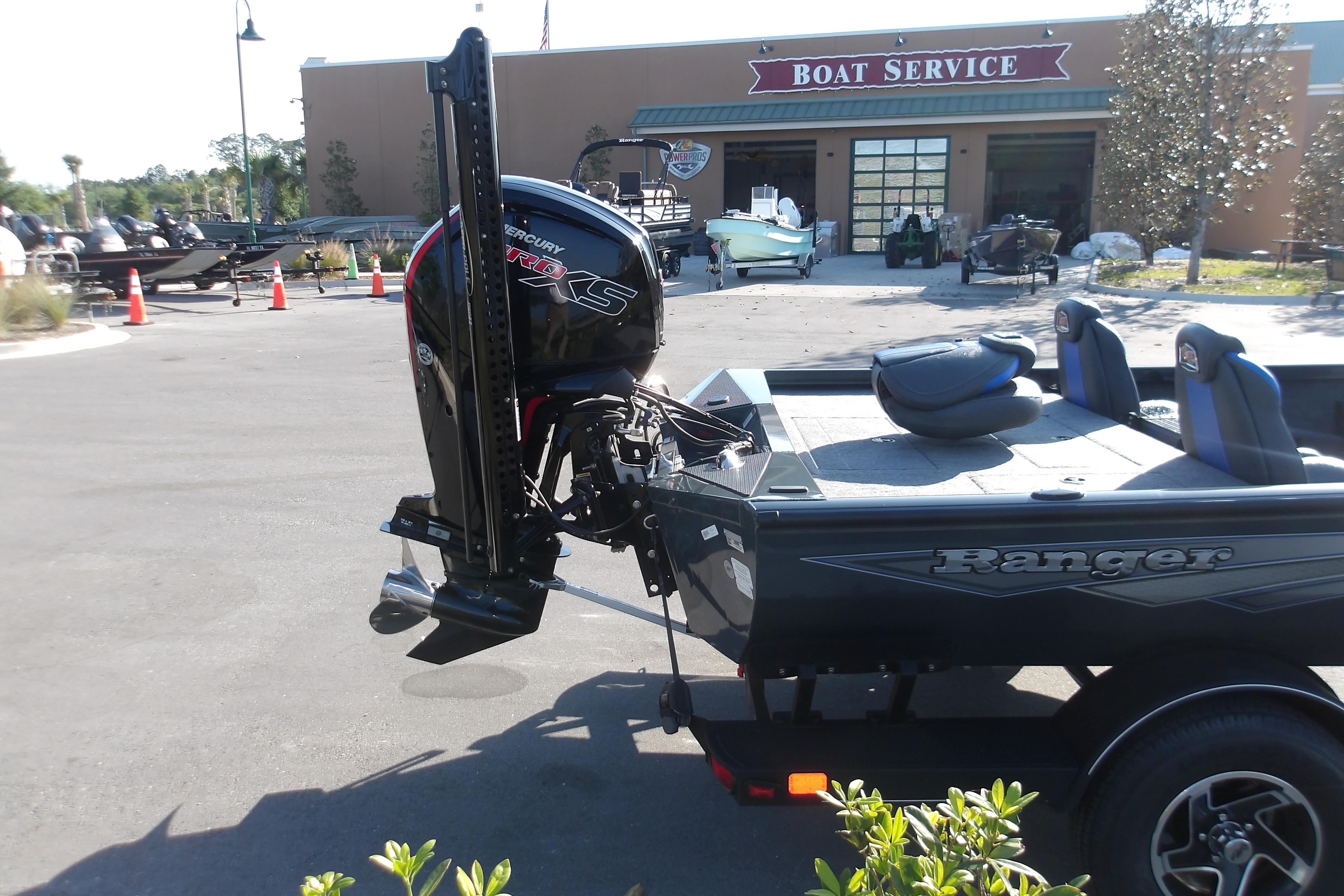 2024 Ranger RT188P boat with Mercury engine at a boat service center.