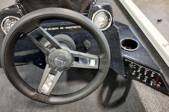 2024 Lowe Stinger 188 boat dashboard with steering wheel and control panel.
