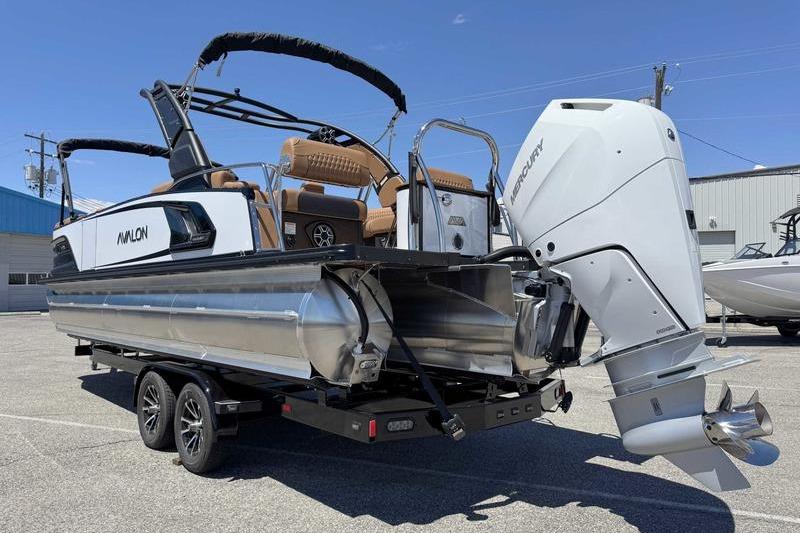2026 Avalon Excalibur LTD Quad Lounge 27' pontoon boat with Mercury outboard engine.