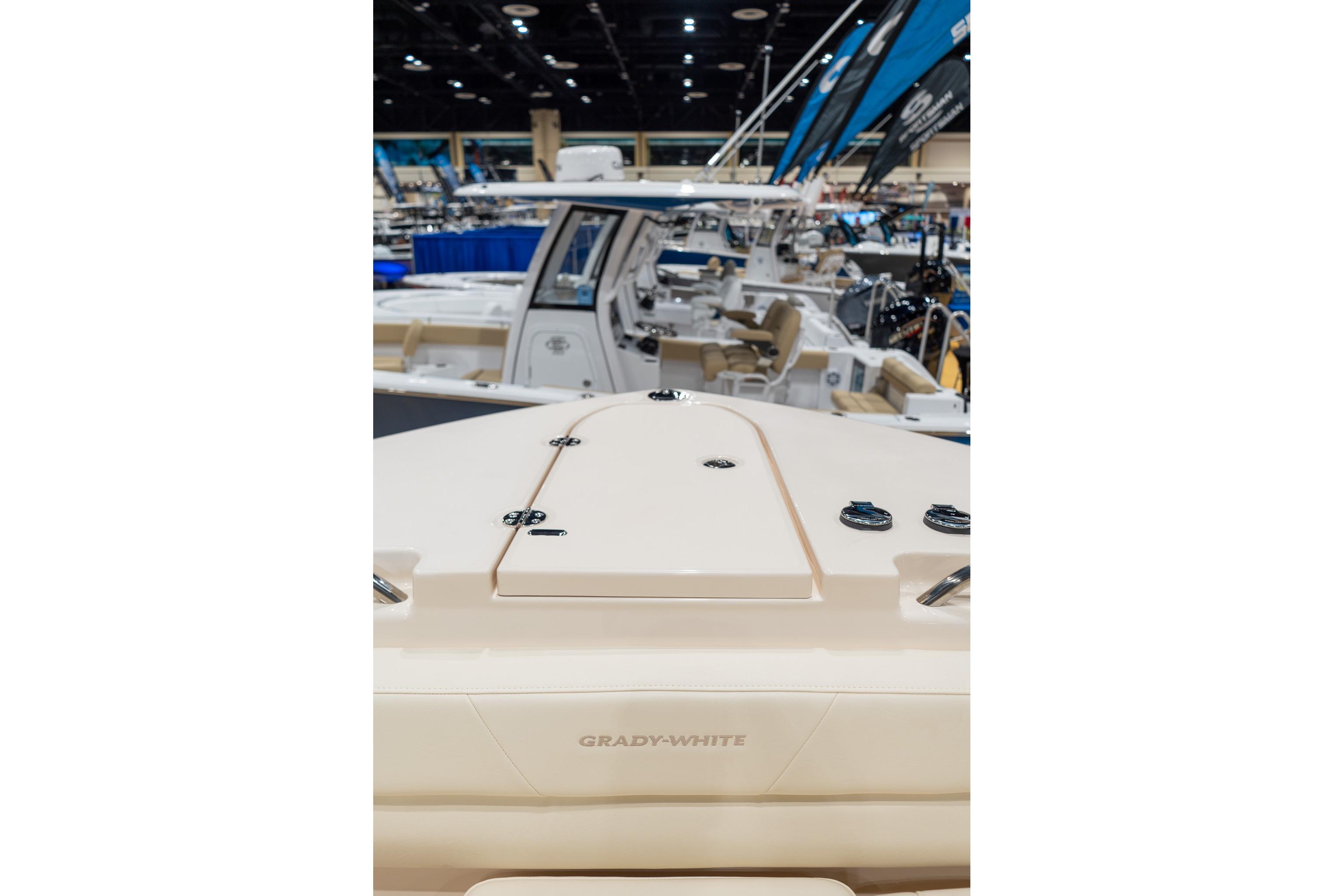 2026 Grady-White Canyon 326 boat showcased at a marine exhibition.