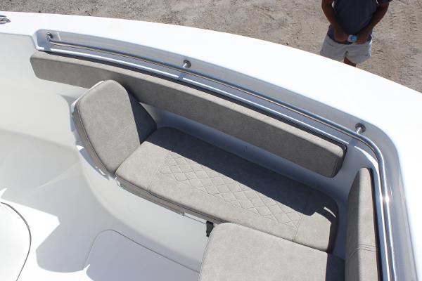 2023 Sea Pro 239 Center Console boat seating area with cushioned bench and backrest.