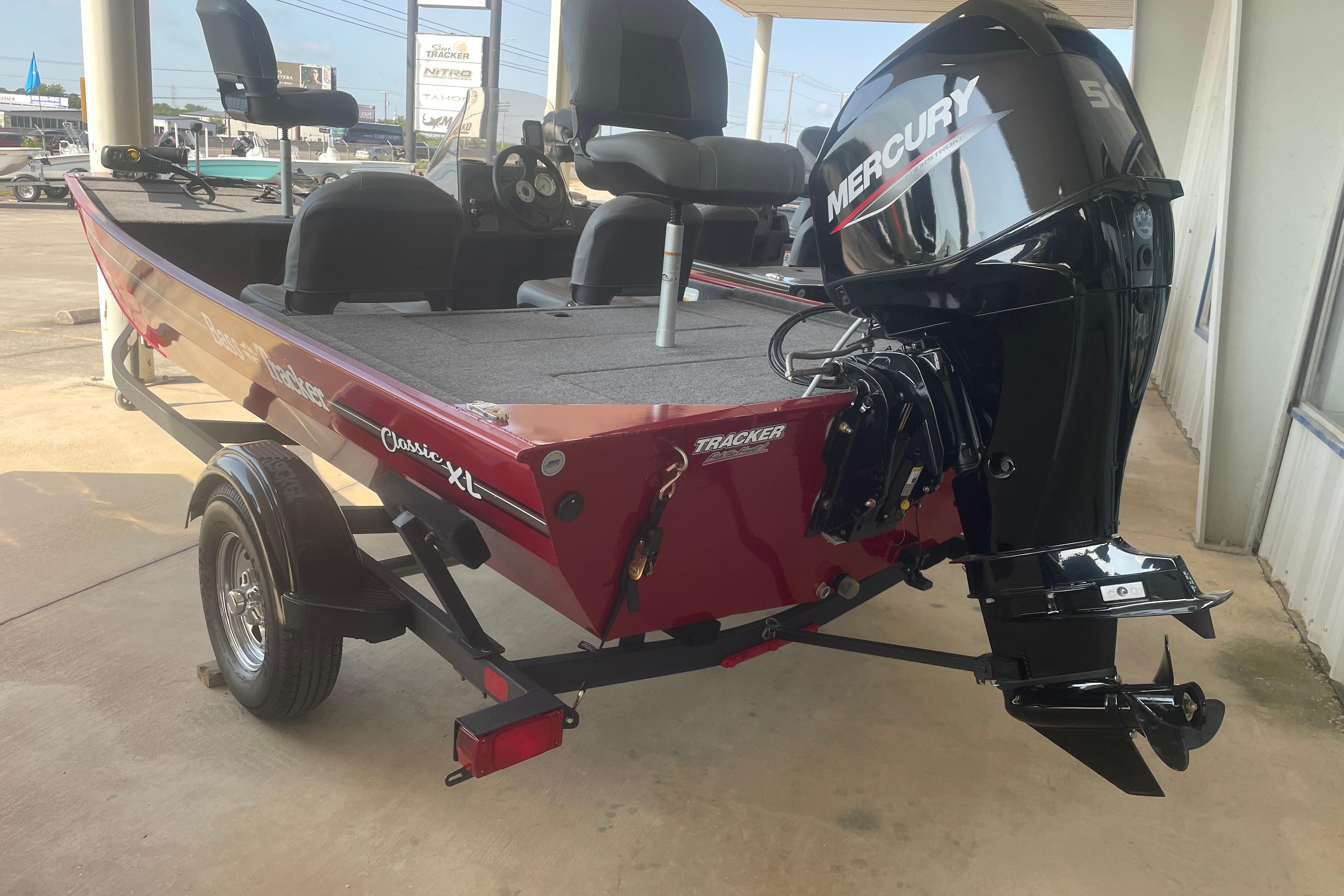 2026 Tracker Bass Tracker Classic XL boat with Mercury engine, parked on a trailer.