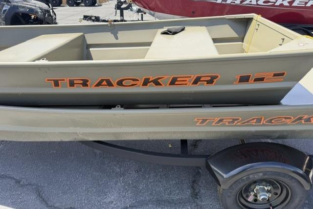 2026 Tracker Grizzly 12 Jon boat on trailer, showcasing durable design and branding.