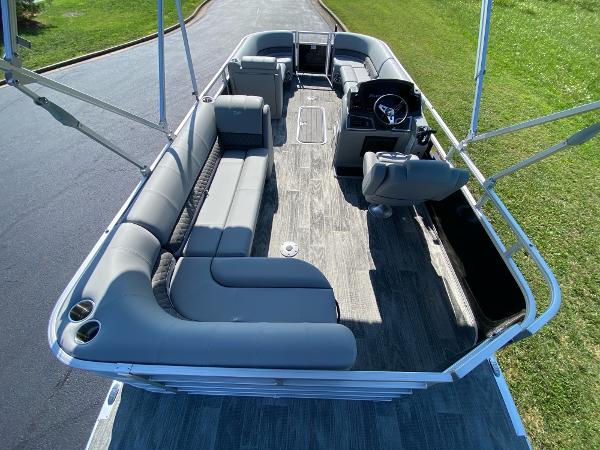 2024 Ranger Reata 223C pontoon boat with spacious seating and modern helm.