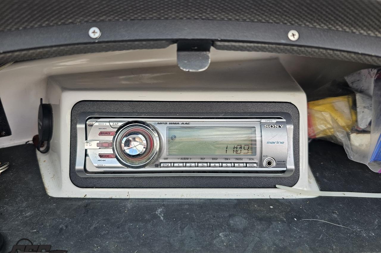 Sony marine stereo system in a 2010 Cobalt 232 WSS boat dashboard.