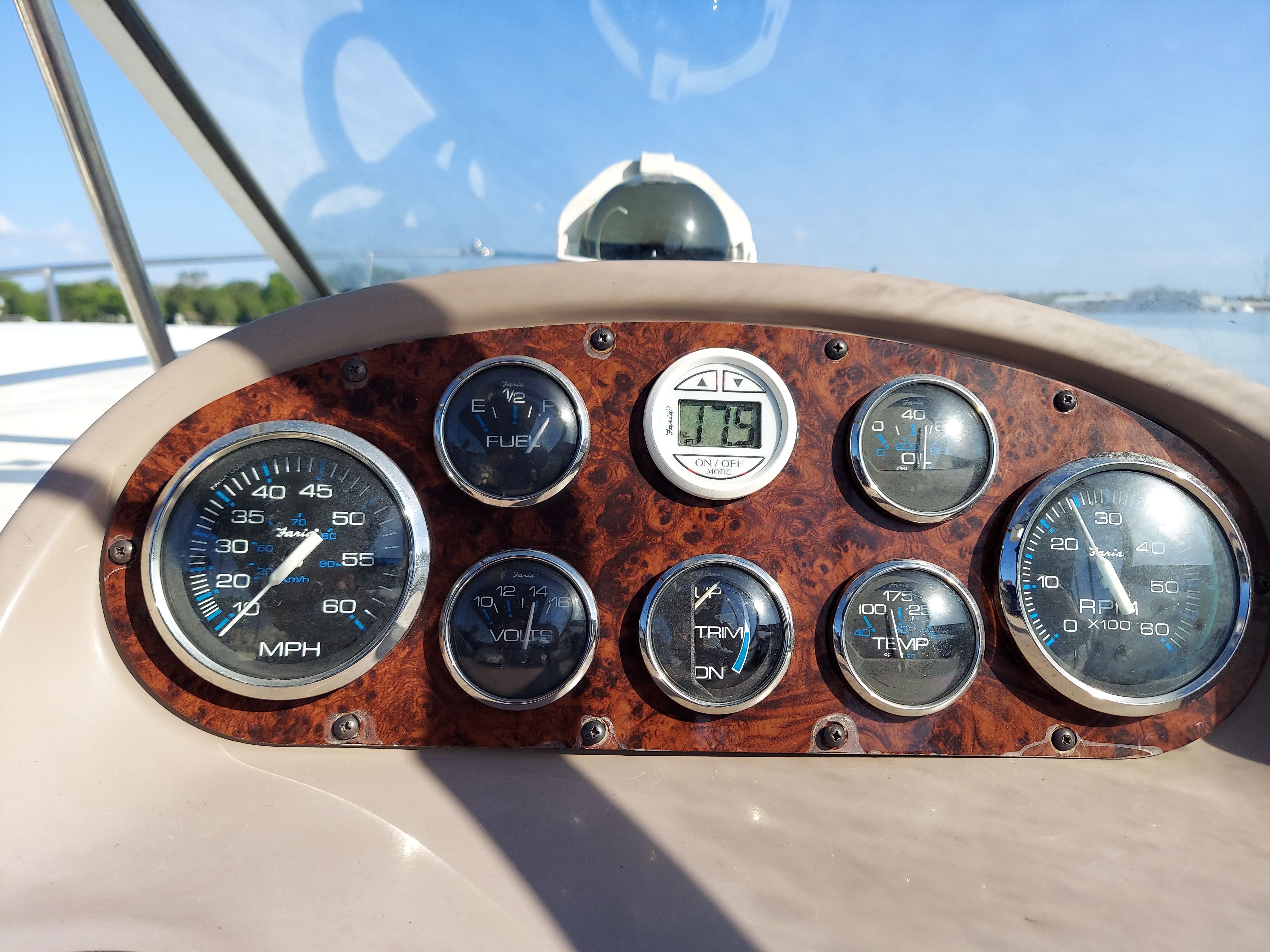 Dashboard of a 2004 Regal Commodore 2465 boat with gauges.