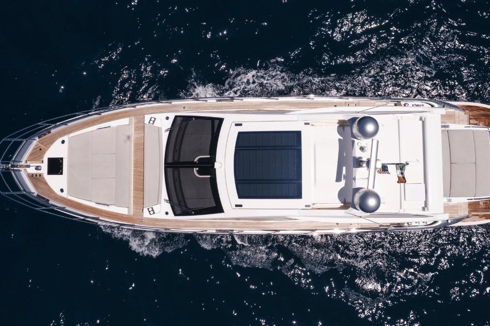 Aerial view of 2020 Azimut 60 yacht cruising on the ocean.