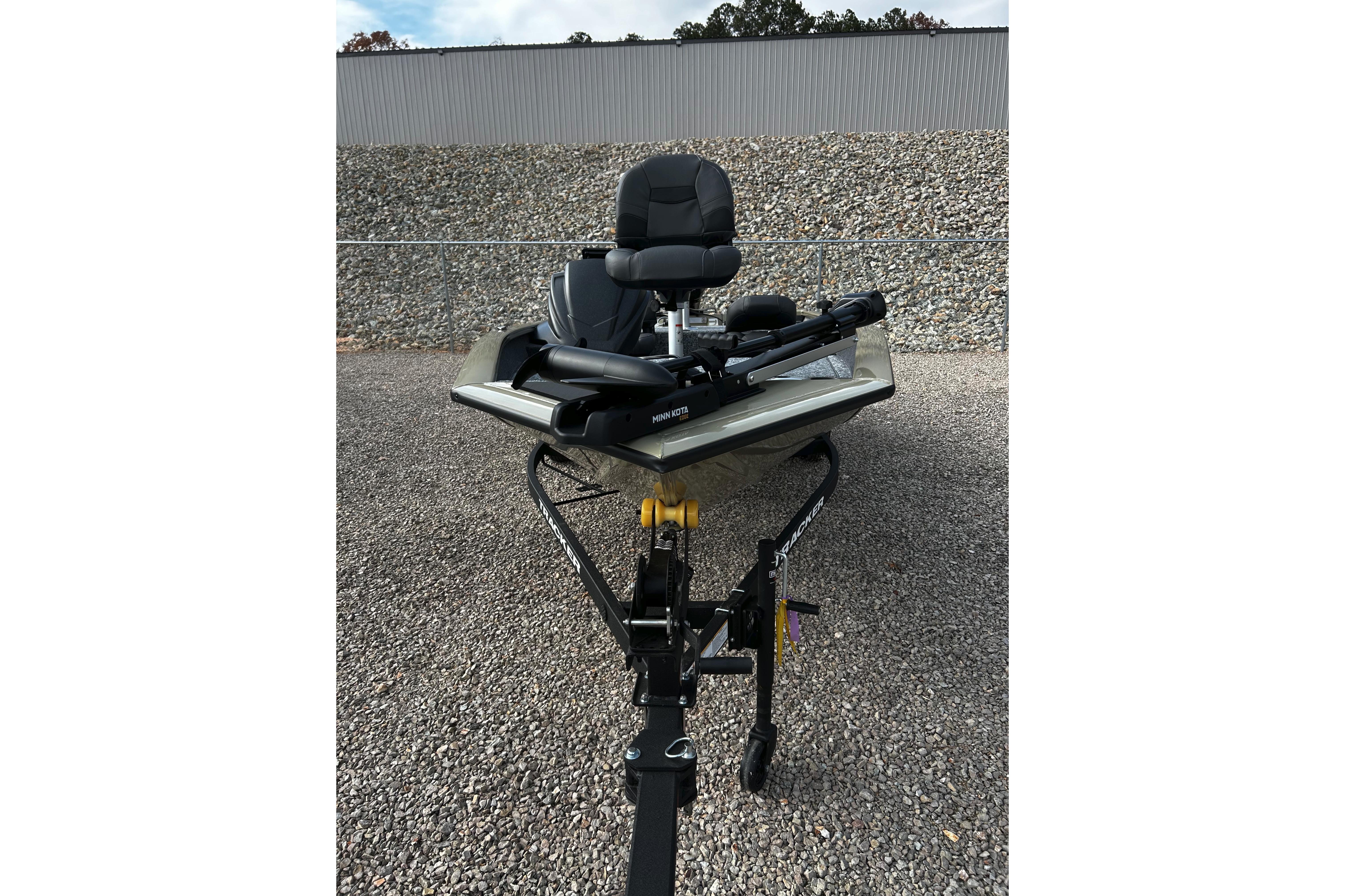 2026 Tracker Bass Tracker Classic CC boat on gravel, front view.