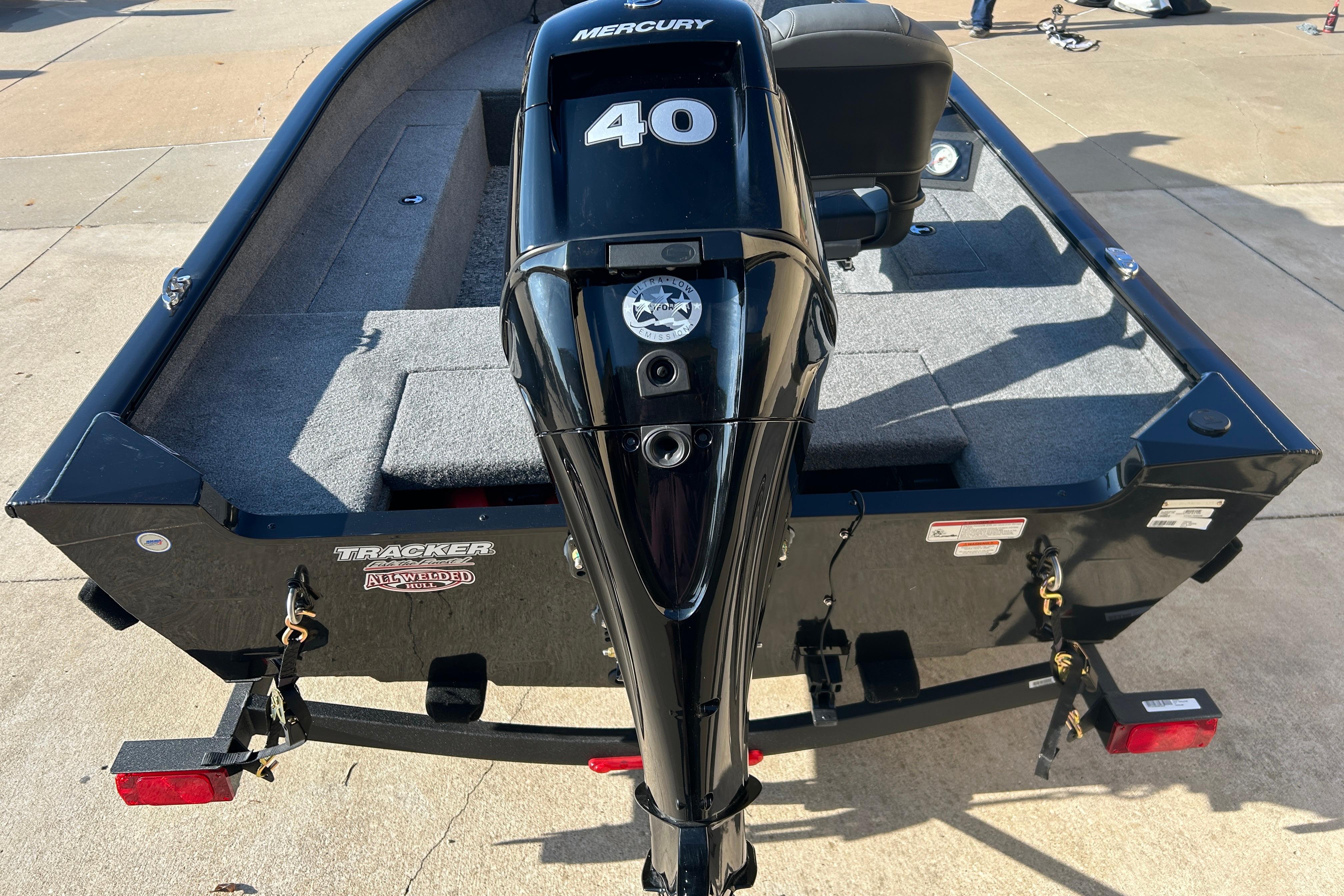 2025 Tracker Super Guide V-16 T boat with Mercury 40 engine on trailer.