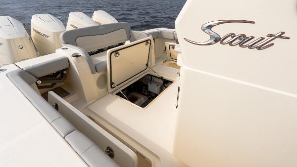 2025 Scout 425 LXF boat interior with open storage compartment and seating.