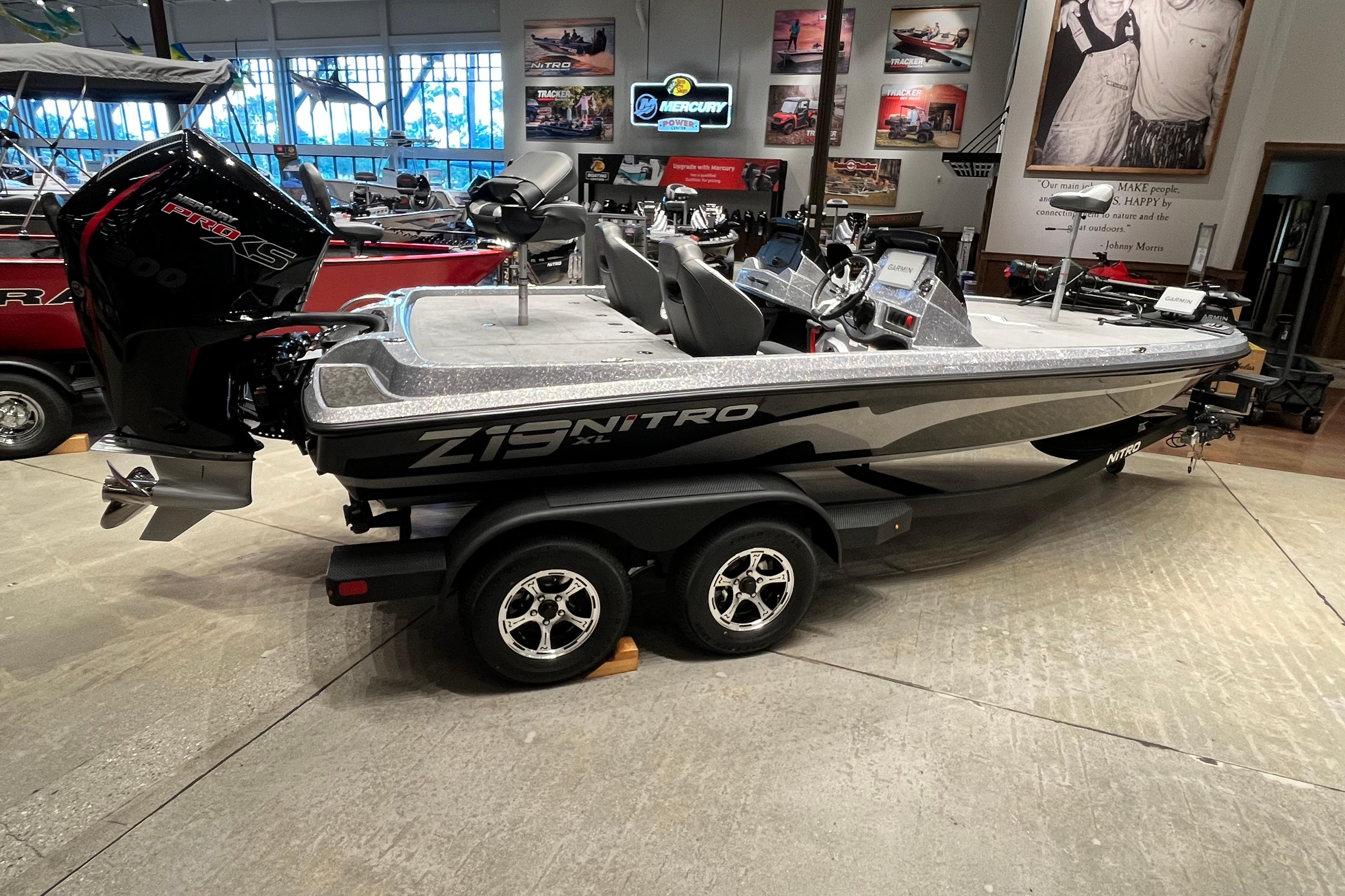2026 Nitro Z19 XL Pro boat displayed in a showroom with sleek design and modern features.