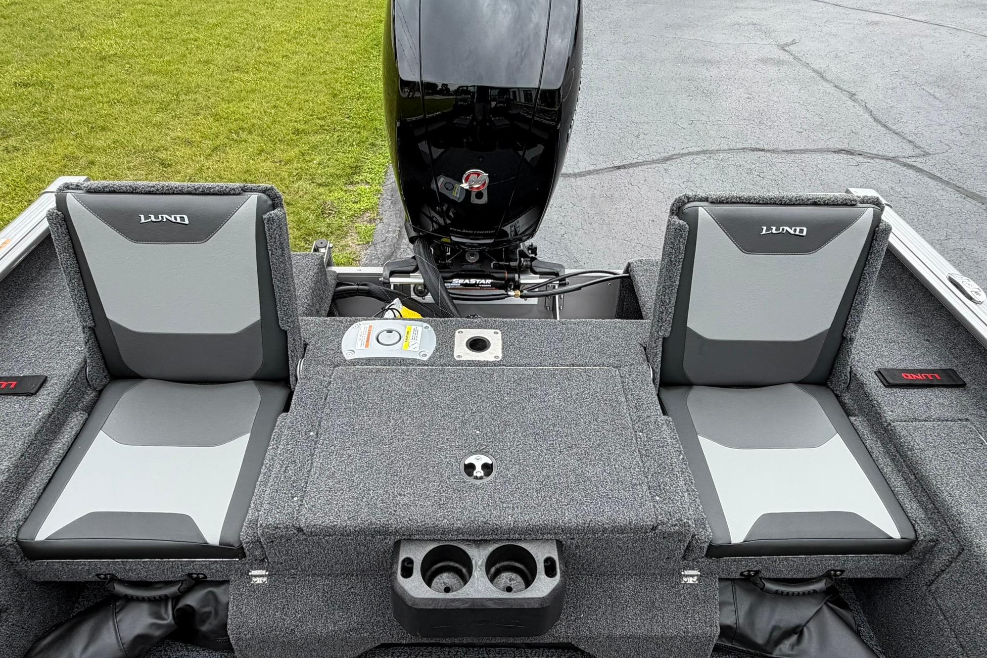 2027 Lund 1875 Impact XS Sport boat interior with dual seats and motor.