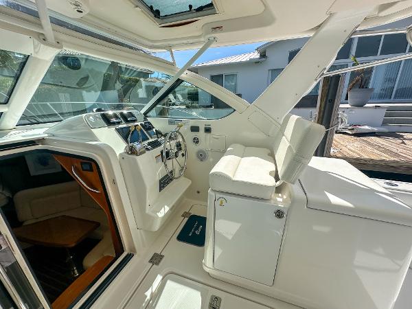 2006 Tiara Yachts 3200 Open cockpit with helm and seating area.